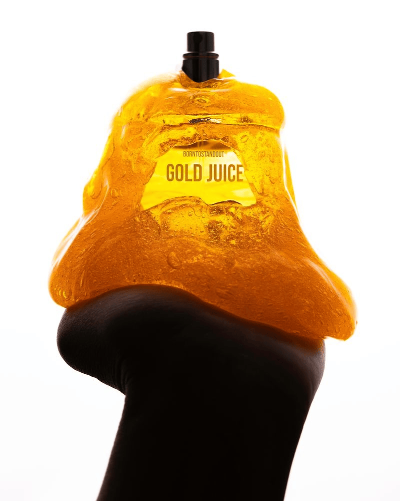 Gold Juice Eau Intimité by Borntostandout 2025 – durian mango caramel niche fine fragrance perfume campaign ad, Duriangate Scent of Scandal trend Dark Tropicana by WSSC