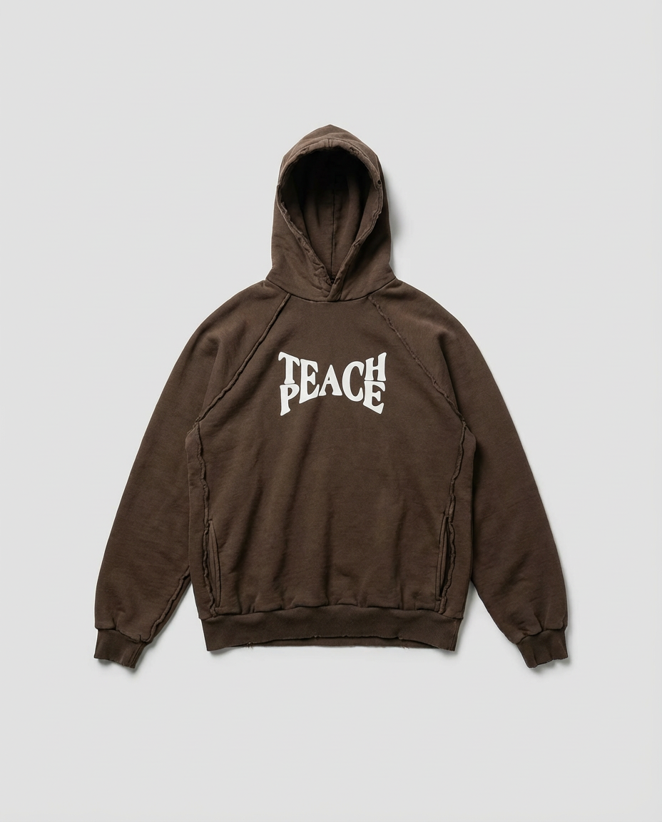 W25 Teach Peace Flat Lay Front Brown.png