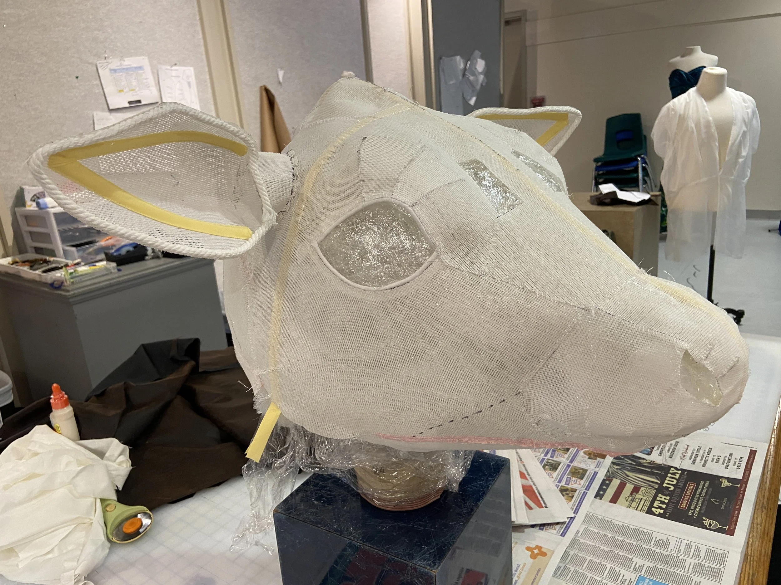 I filled the inside with a layer of plastic wrap then stuffed the mask to give it shape