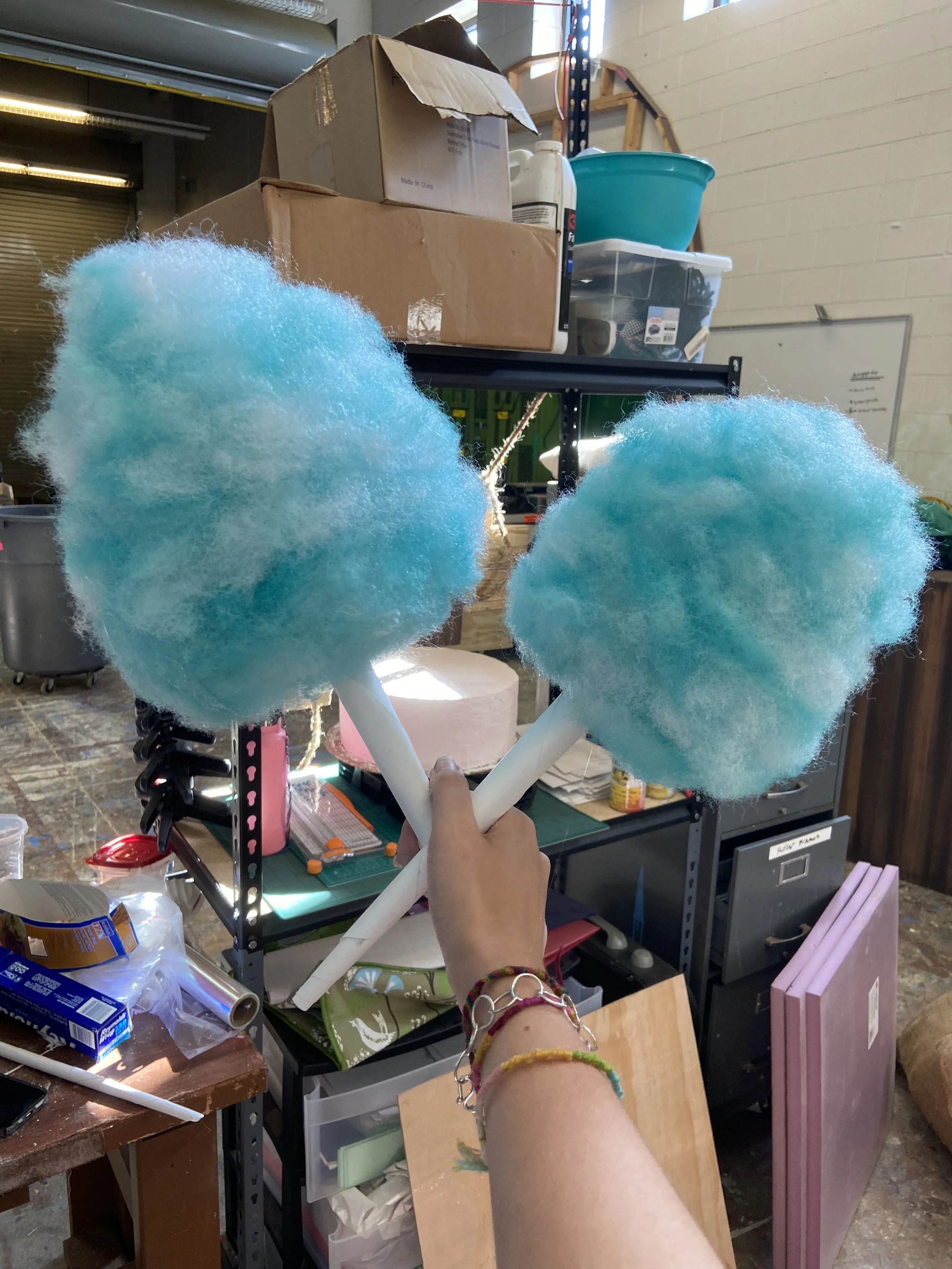 Cotton candy made with paper, cotton stuffing, and spray paint