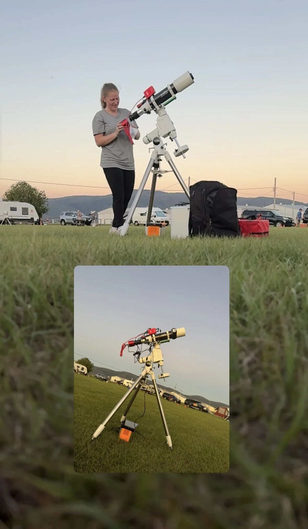A women adjusting a telescope on a grassy field at sunset, with camping trailers and cars in the background.