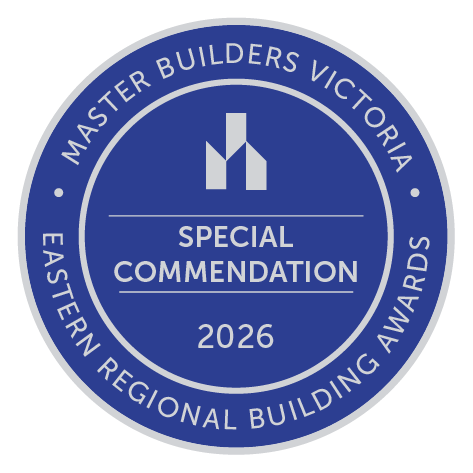 Blue circular badge with white text and logo, reading 'Master Builders Victoria, Special Commendation, 2026, Eastern Regional Building Awards'.