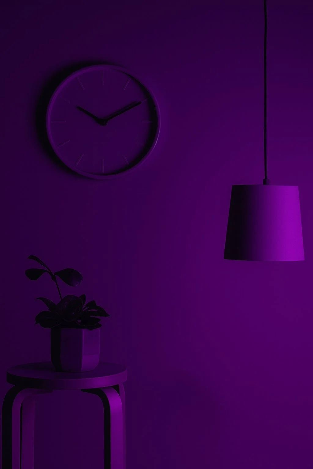 A purple-lit room with a wall clock, a hanging lamp, and a potted plant on a small table.