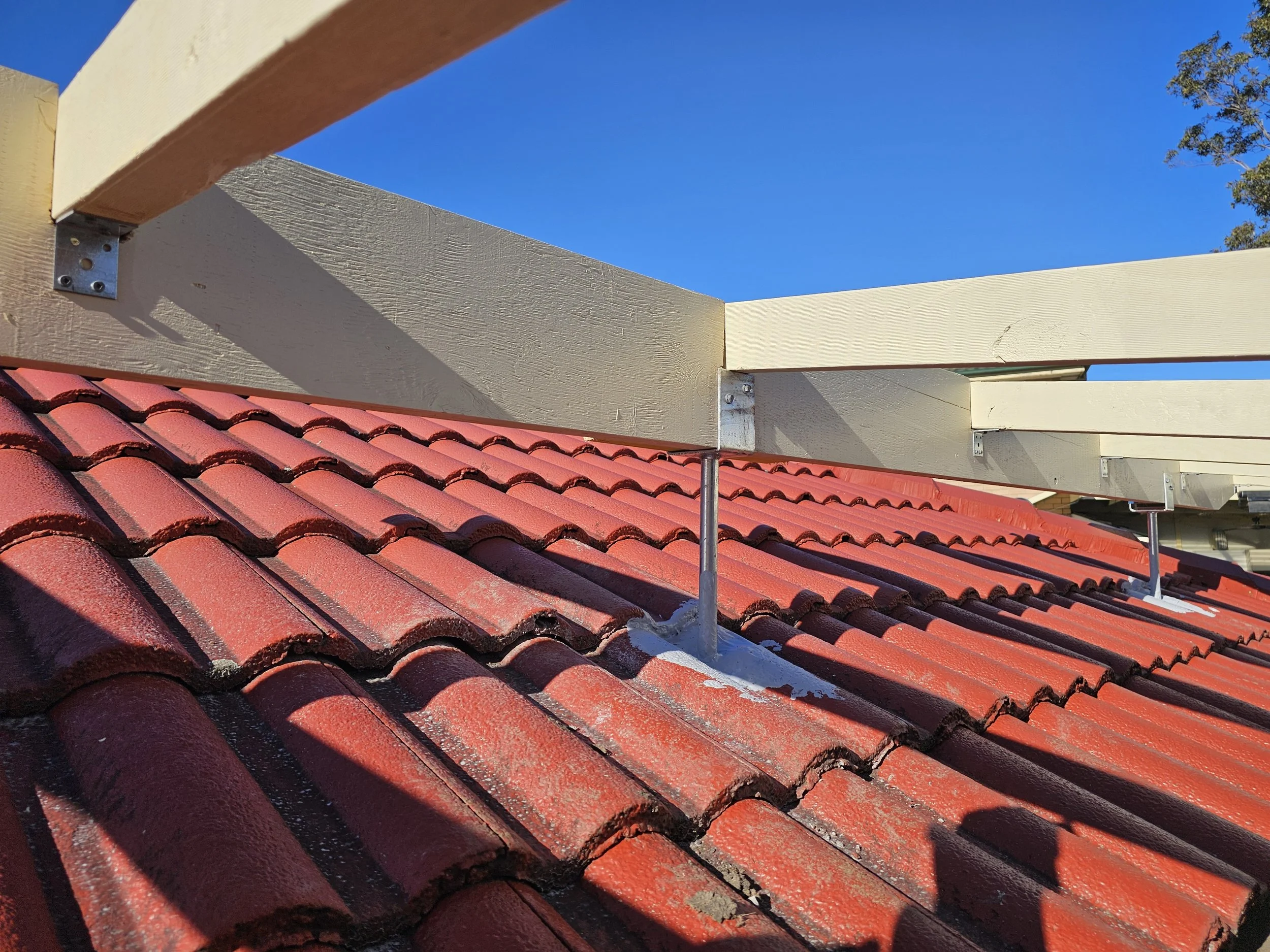 Attached to roof rafters with jack brackets