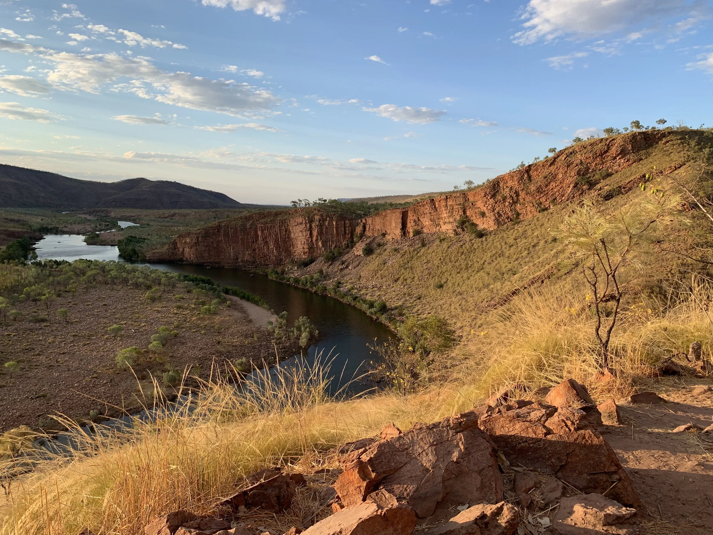 Ord River winding through red rock cliffs at sunset in the Kimberley, symbolising growth and strength – HK Pychology mental health support Western Australia.