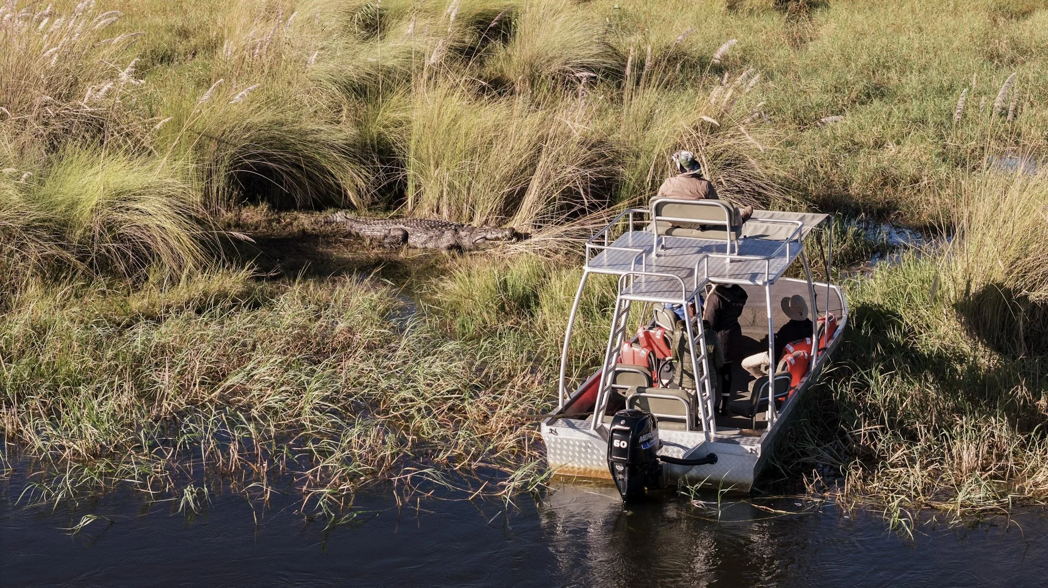 33-Bots_Mbamba_Boating 2.jpg