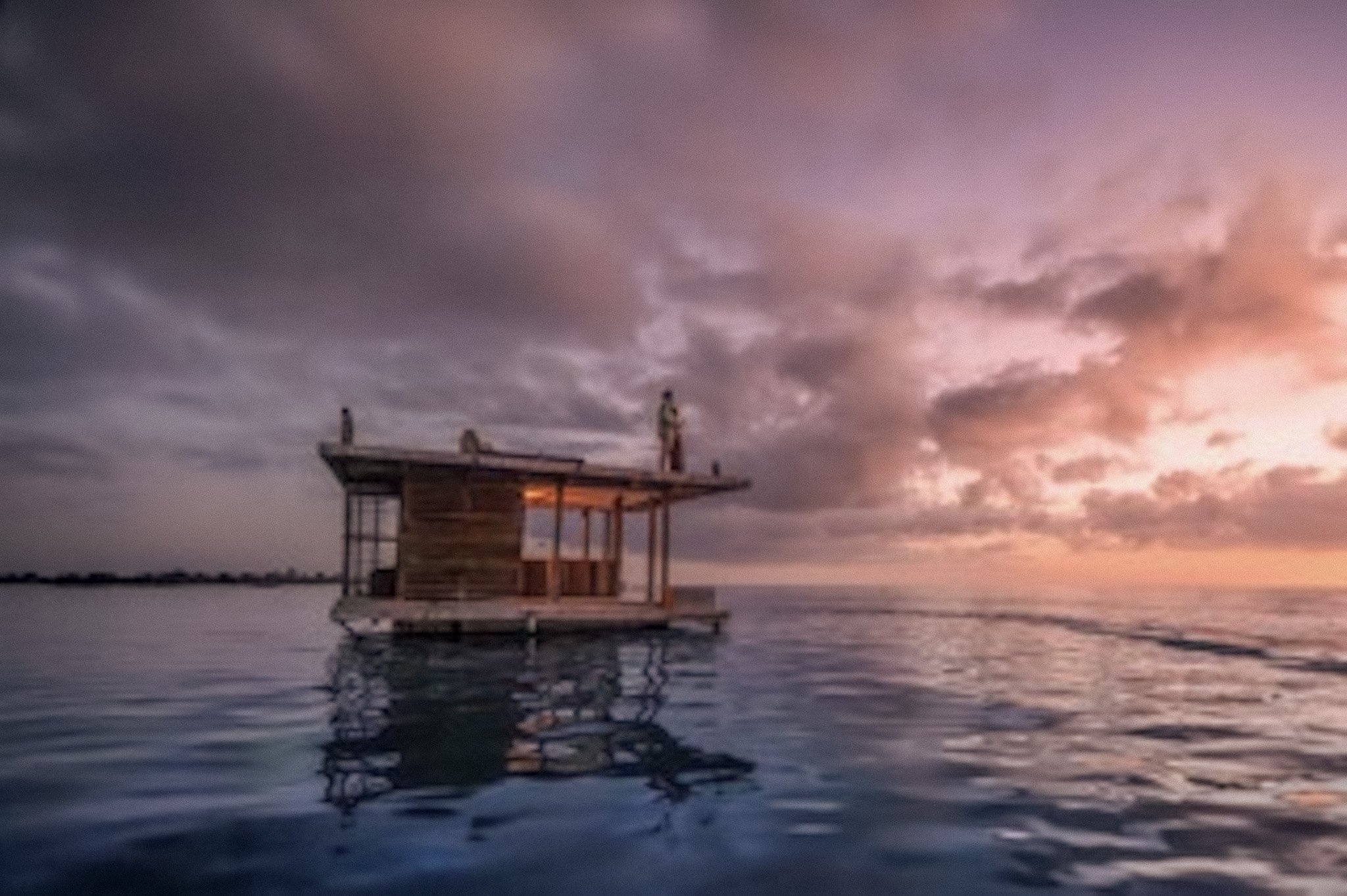 Backdrop_SunsetCoupleUndeerwaterRoom Small.jpg