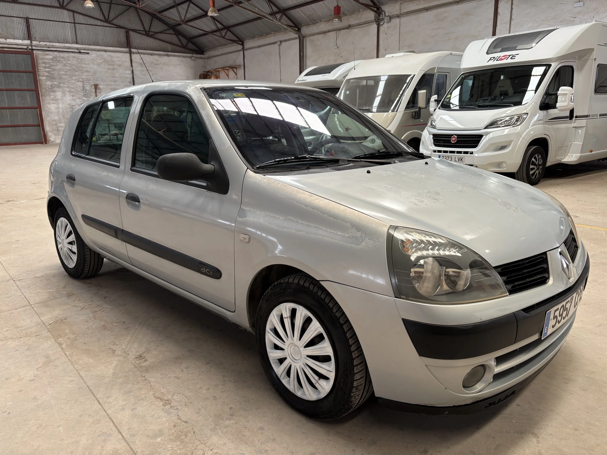 A silver Renault hatchback car for rent rent a car vehicle hire