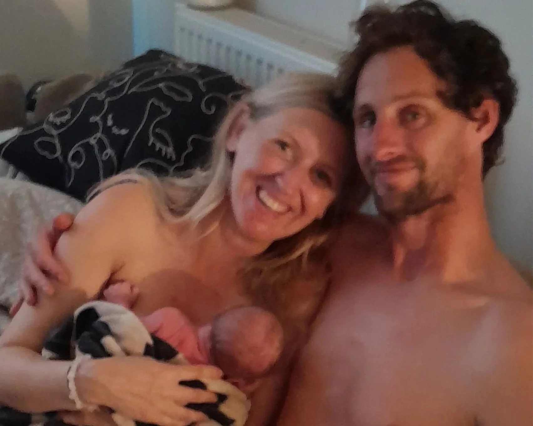 Parents with their newborn baby