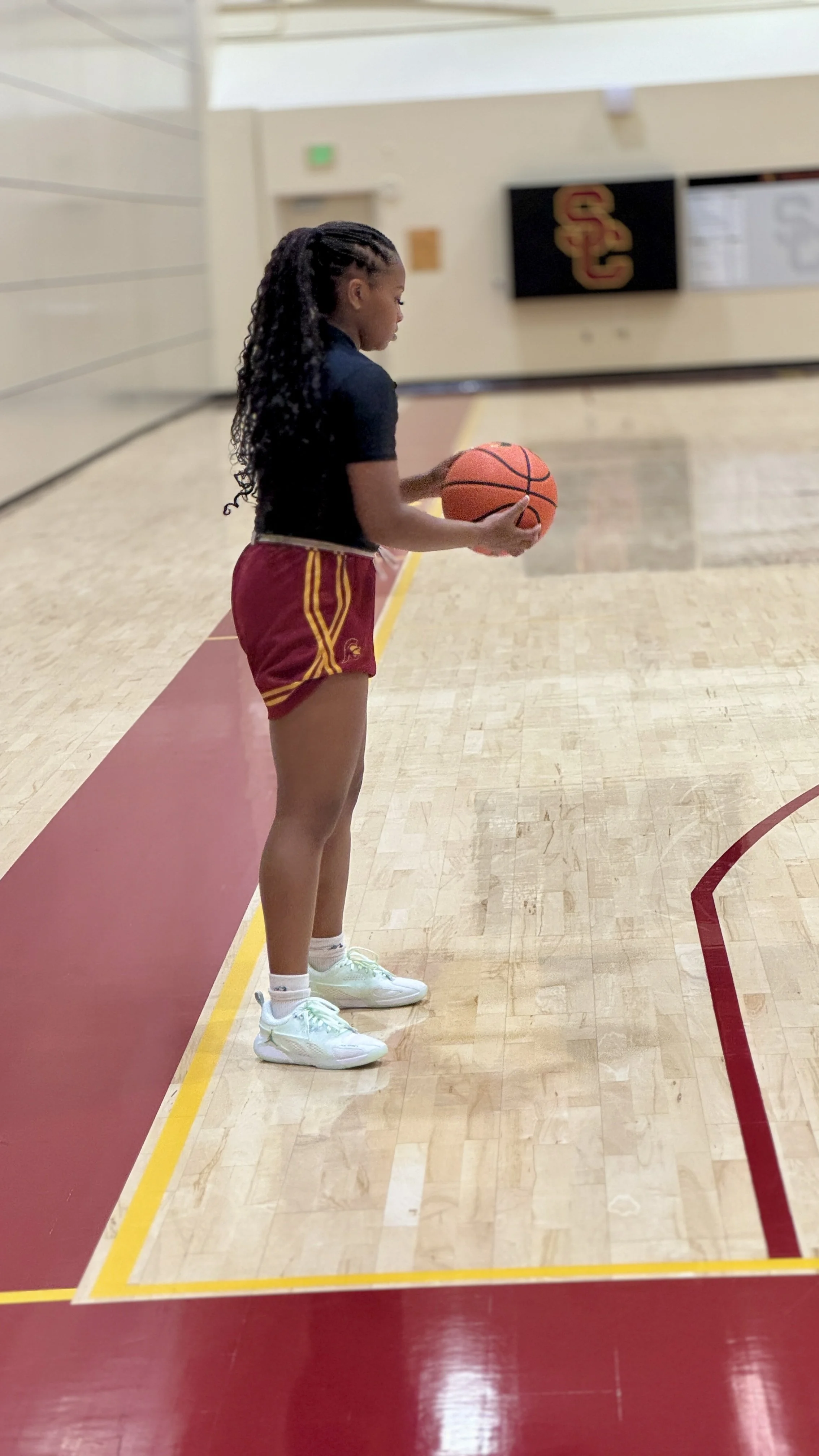 Londynn putting shots up after practice