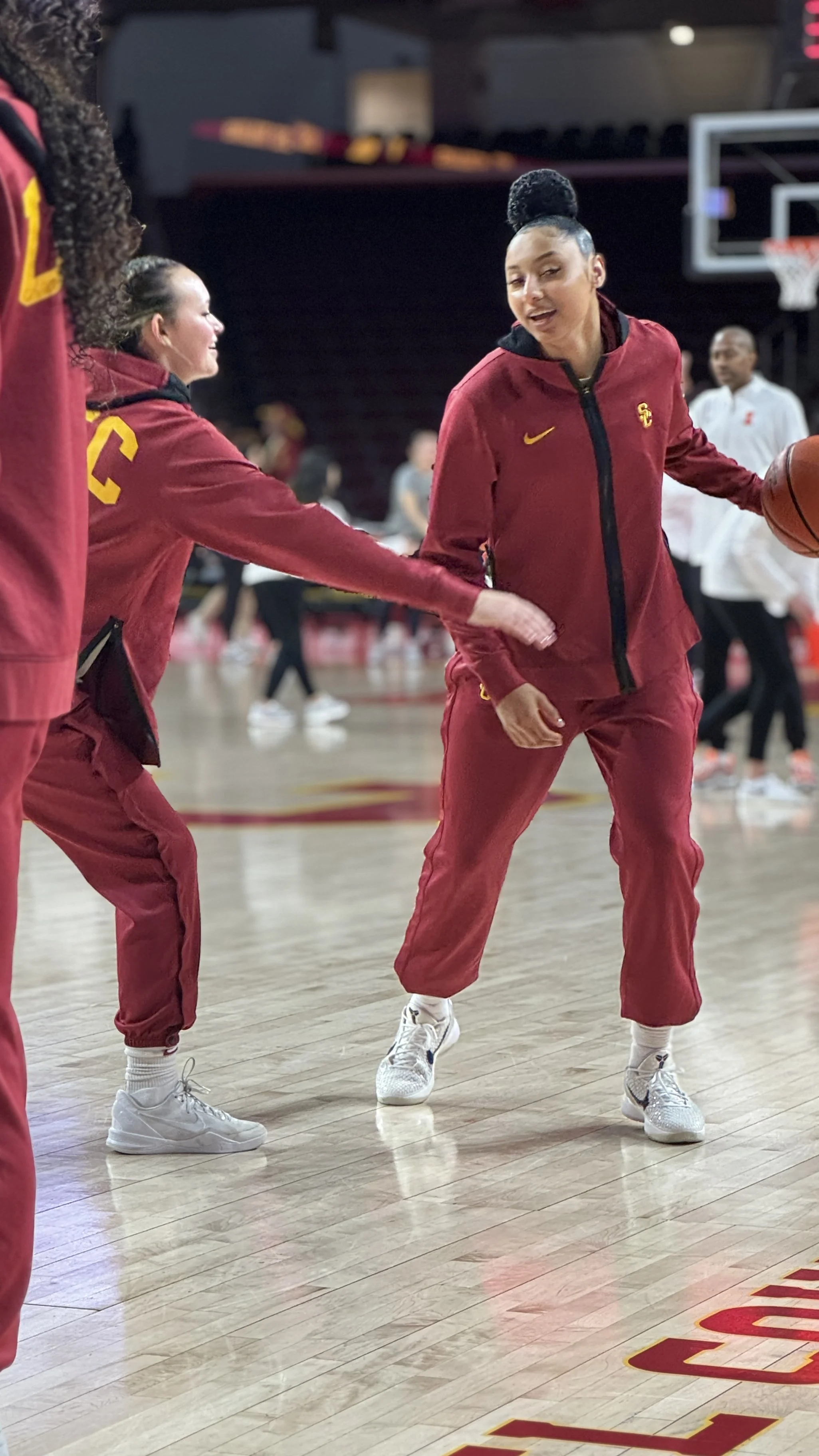 Juju playing with Rian during warm ups