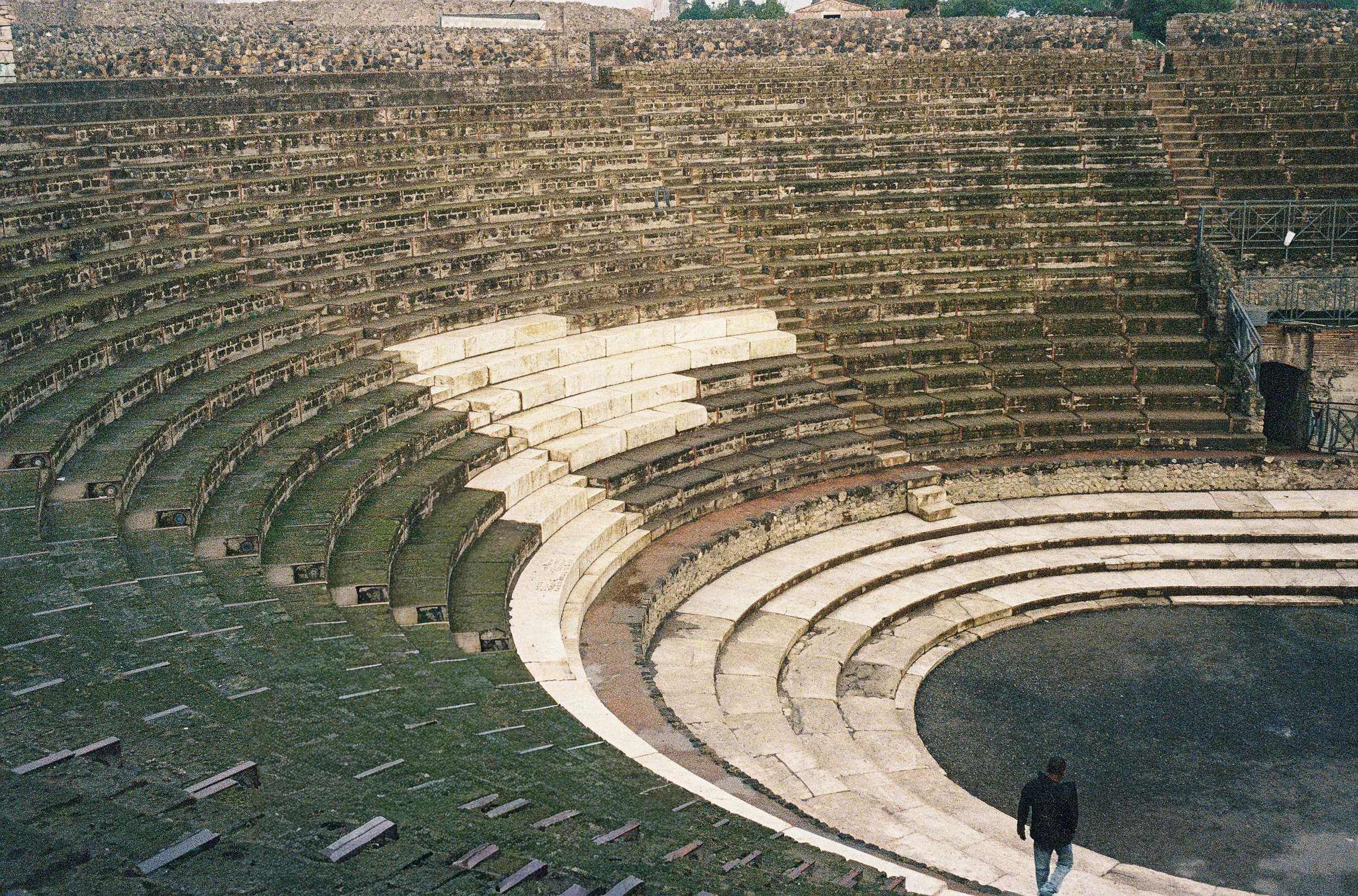 Ancient amphitheater seating at the Pompeii ruins in Italy.
