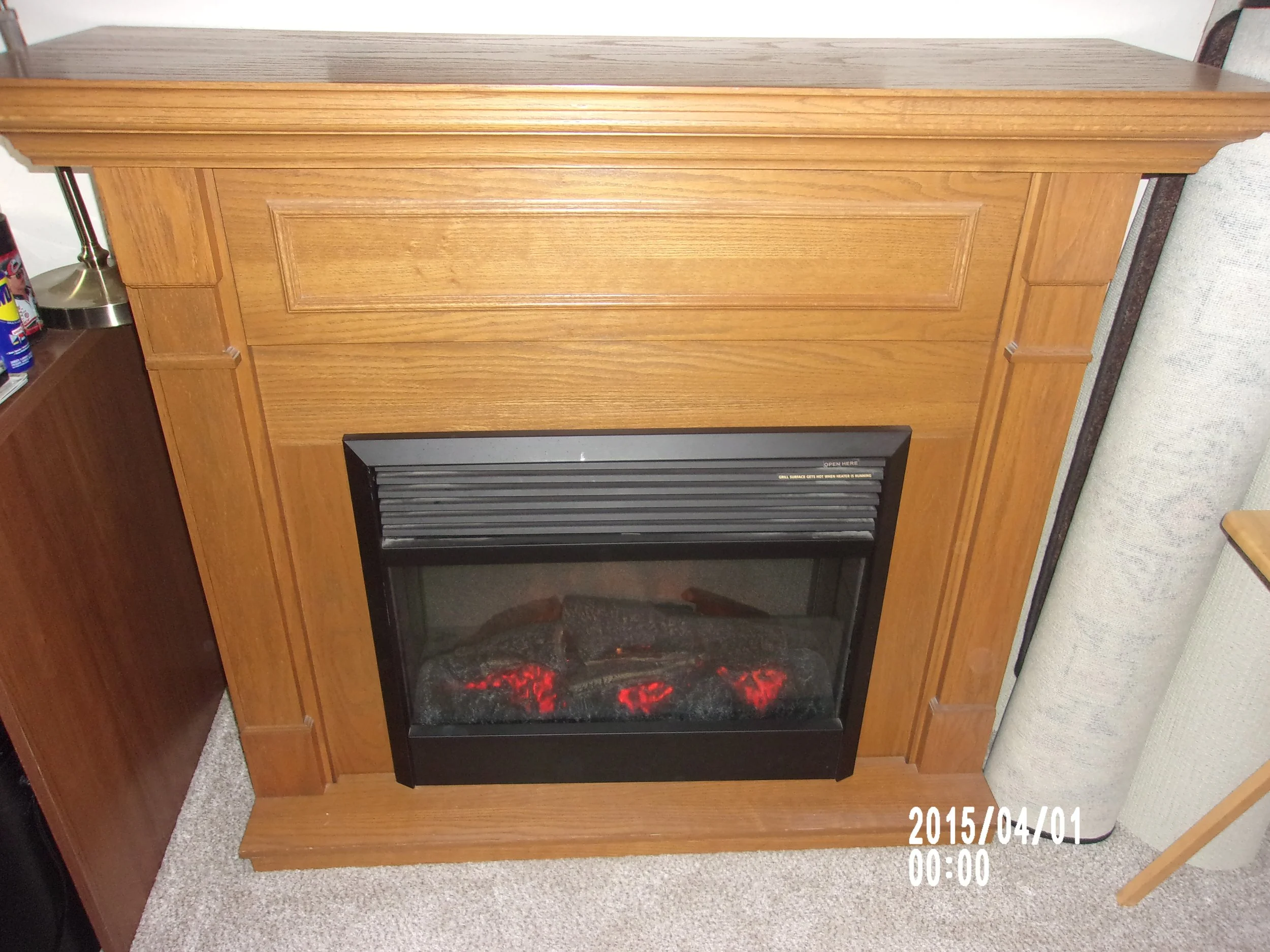 " Electric Fireplace w/Mantle  Name: Michael McClintic Item Description: Electric heating Fireplace with Wood Mantle 52 1/2"" W x 43"" tall x 17"" deep
Adjustable fireplace flame, Electric heat w/t-stat solid wood mantle.
Used very little in Florida,
