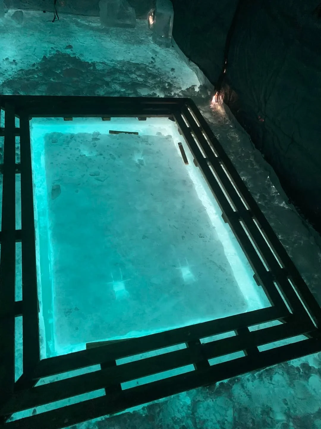 the glow of the ice hole inside the tent