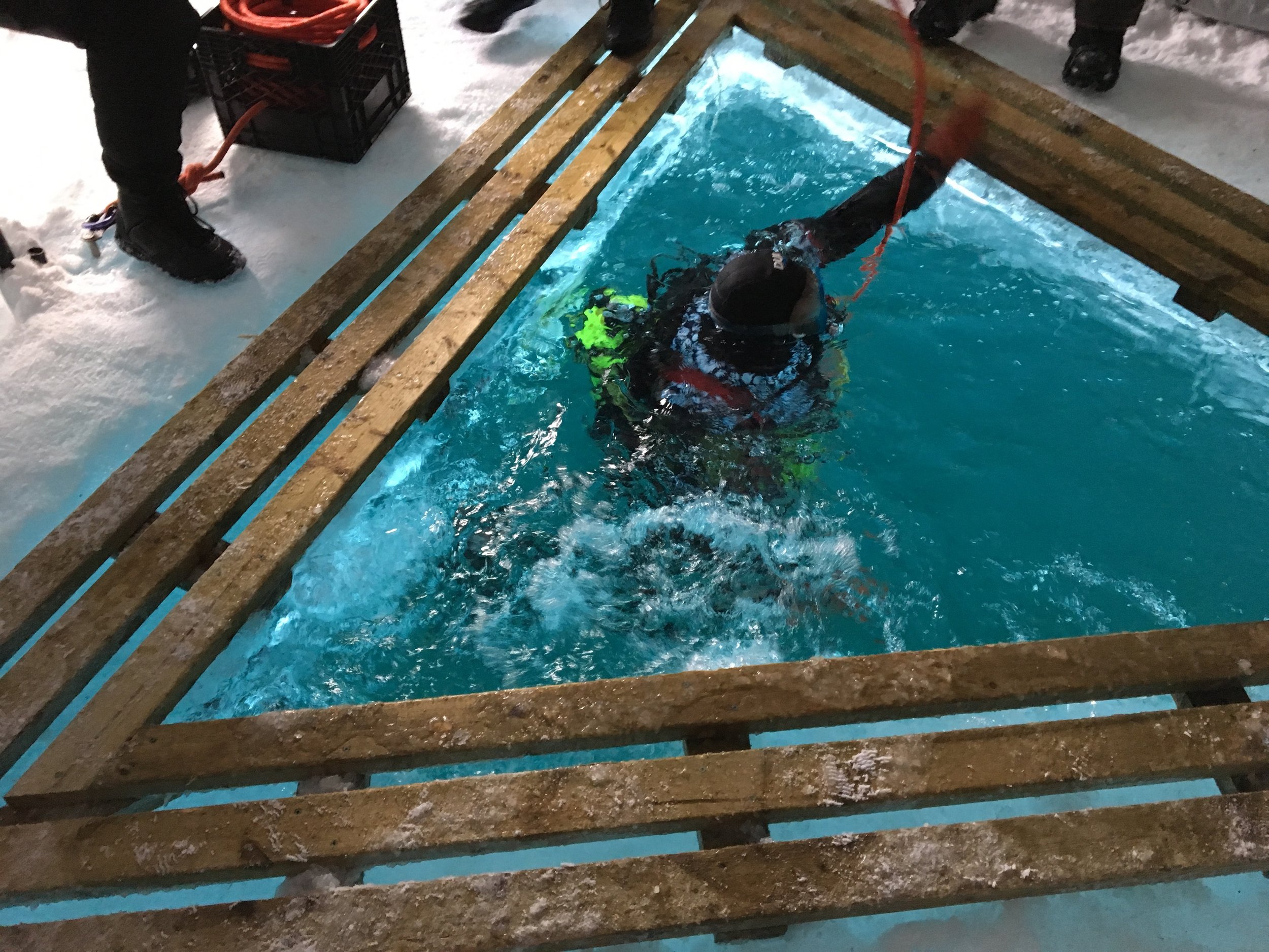 first diver in the ice hole 