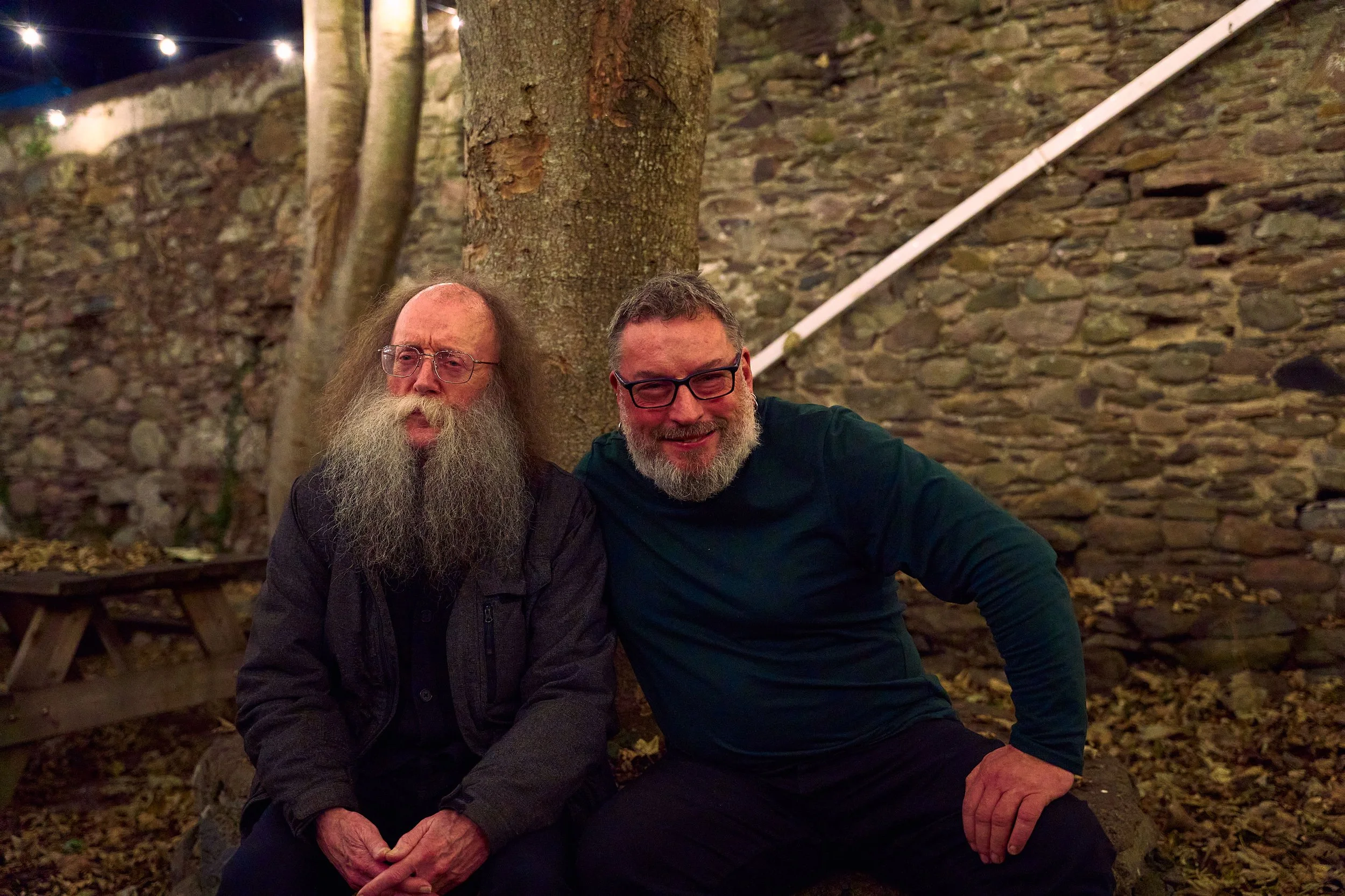 Eddie Lenihan and Seán an Seanchaí sit in the back of Sheila Buns, during An Feile Eile a Halloween festival in Killorglin, Co Kerry
