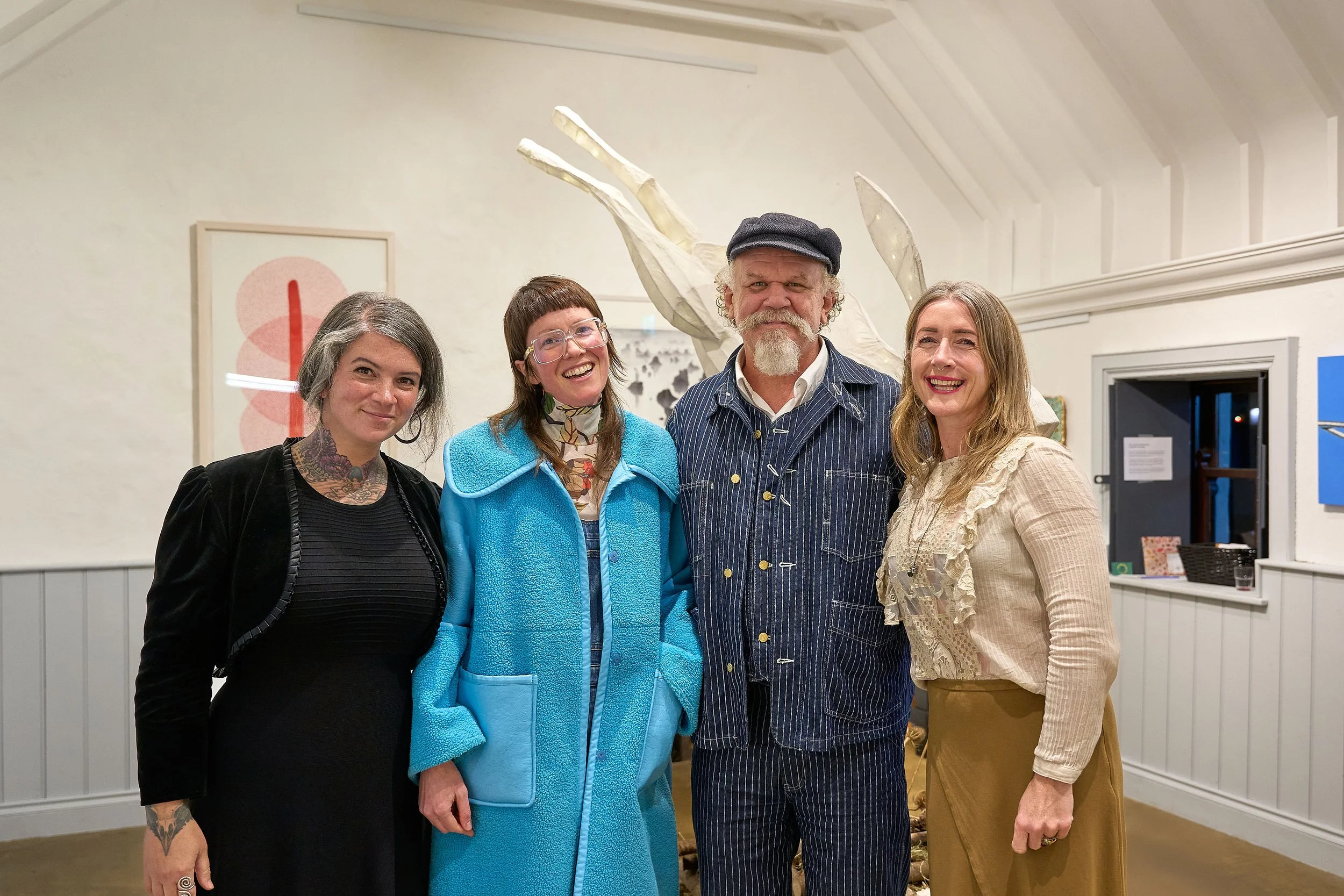 An Feile Eile Launch party at Grilse Gallery in Killorglin, Co Kerry. From left: Lisa Sandow, Aoife Mcbride, John C. Reilly and Fiola Foley. Pictured in front of the Ancestral Effigy made by Phil McSweeney