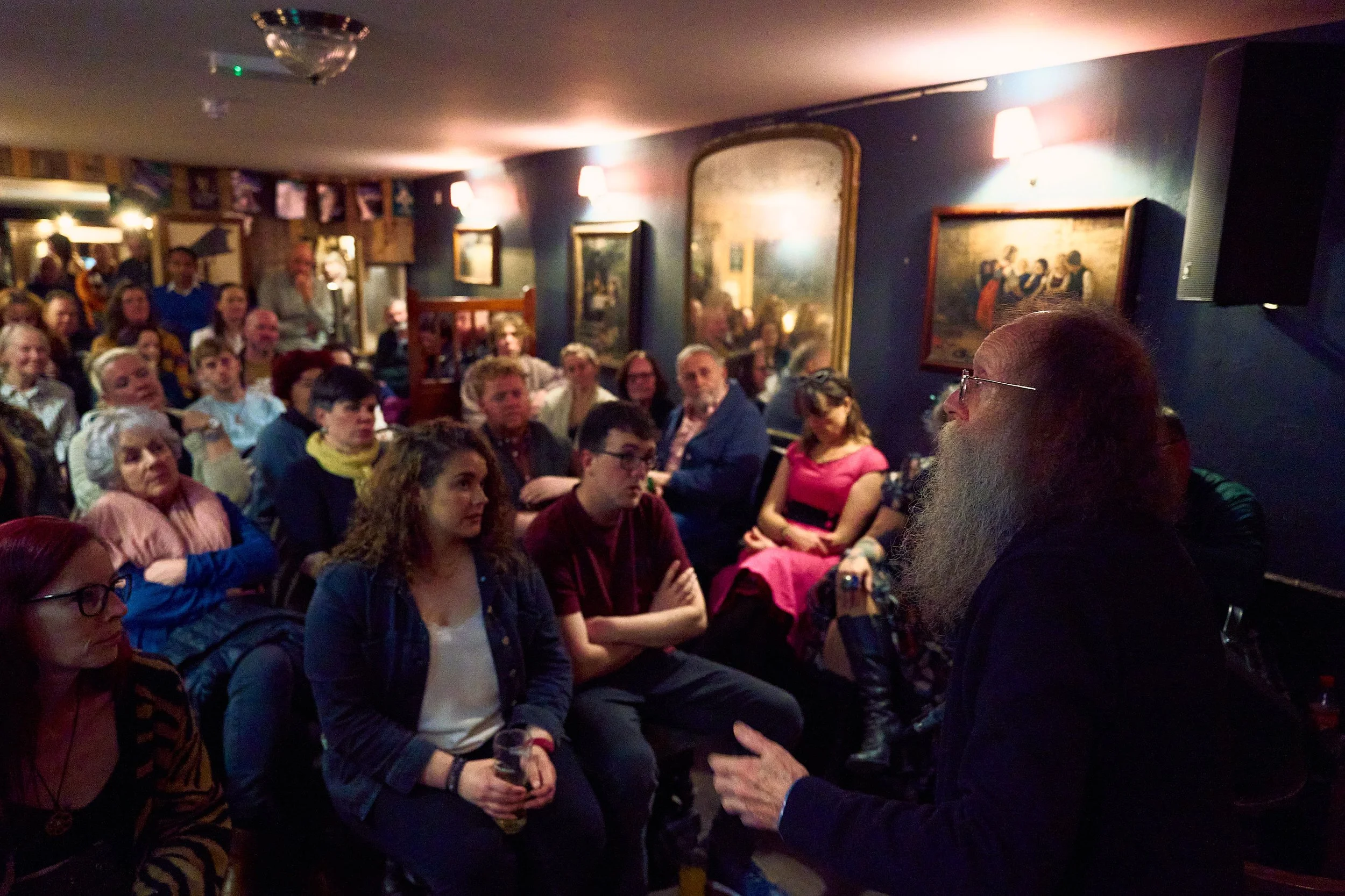 Eddie Lenihan in the grips of dark humor at Sheila Buns in Killorglin, County Kerry. Spooky Irish tales of ghosts and the fairys.  An Feile Eile, Halloween Festival.