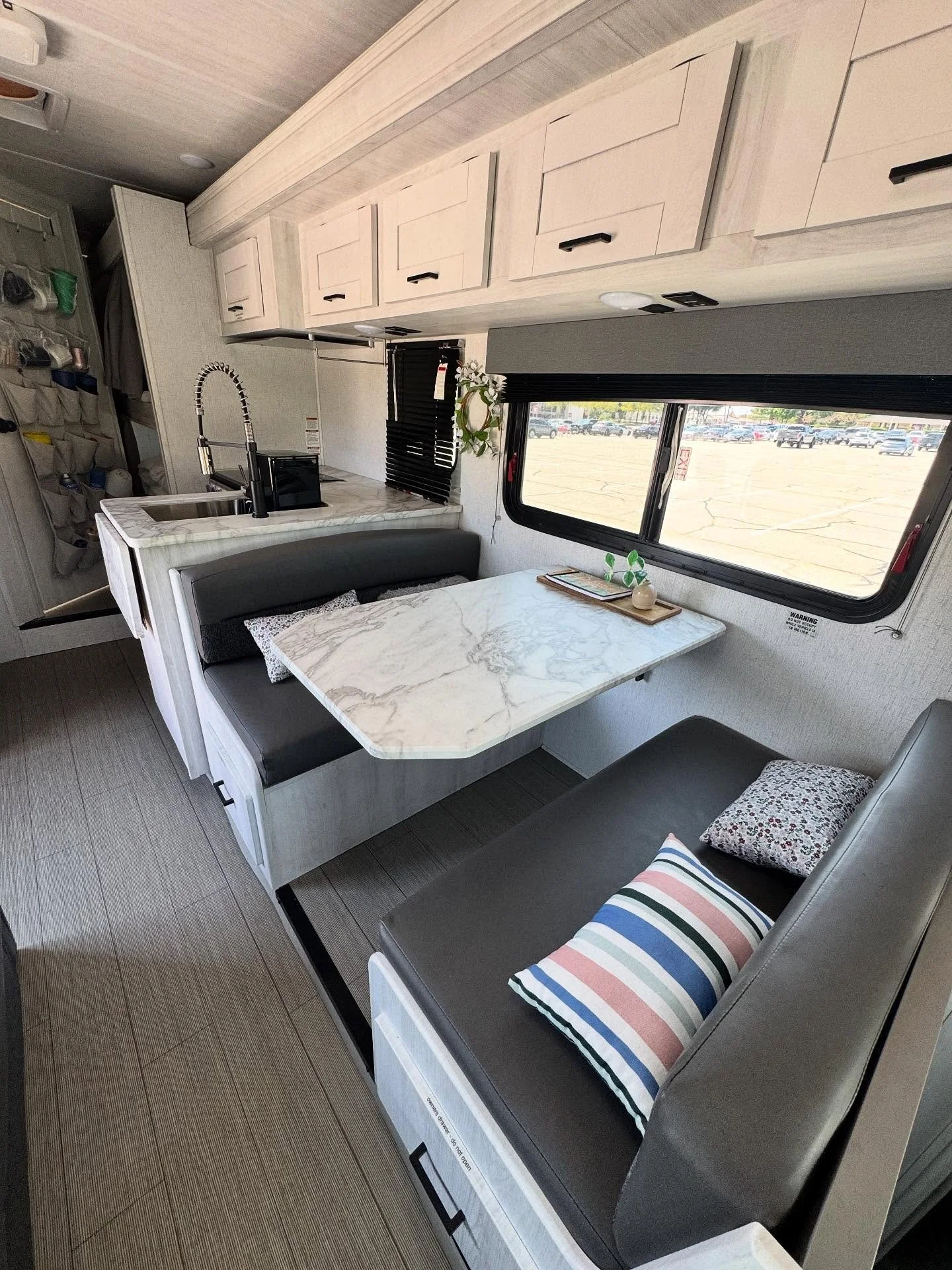 🚐 Meet Rhonda &ndash; your home on wheels with serious style!

Whether you&rsquo;re chasing sunsets, tailgating in comfort, or just looking for a cozy getaway spot, Rhonda is ready to roll. With her sleek marble-look dinette, modern kitchen setup, a