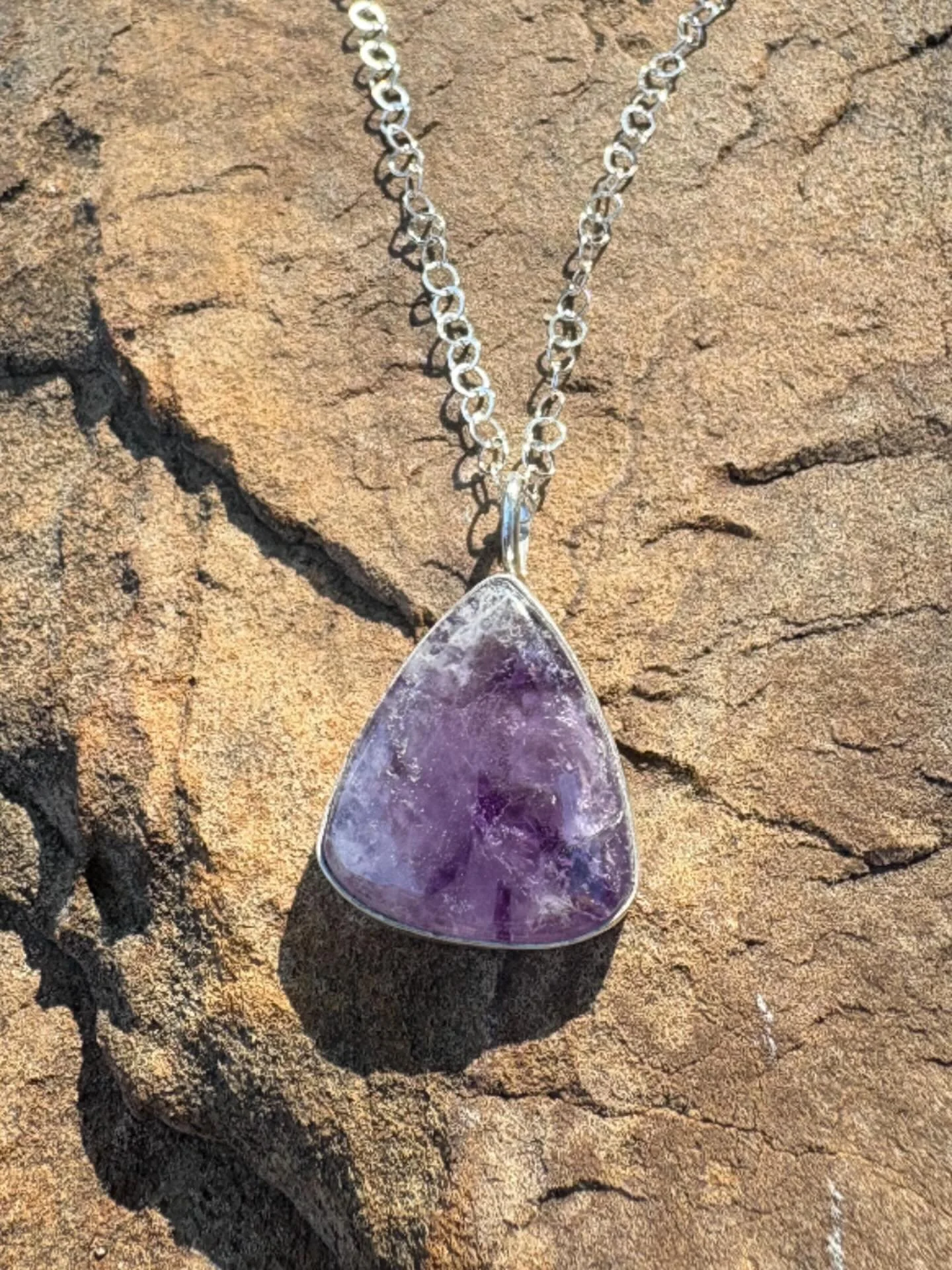 Here&rsquo;s my newest creation.  A unique amethyst stone inlayed in sterling silver. #jewelry #amethyst
#handmade #sterlingsilverjewelry