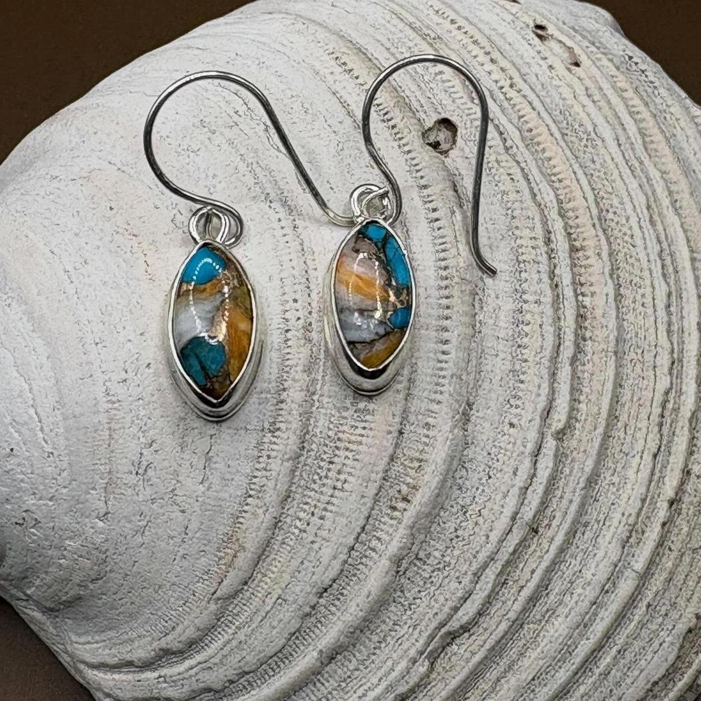 Just finished these Sterling Silver earrings with Turquoise and Spiny Oyster Copper inlay.  I&rsquo;ve also added more items on my website, check it out when you have a chance. #jewelry #earrings #turquoise #handmadejewelry #sterlingsilverearrings