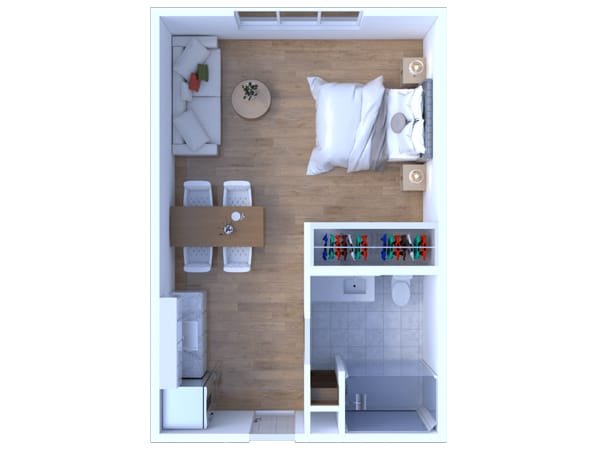 Top-down view of a small apartment with a bedroom, living area, dining table, kitchen, and bathroom at Riverview Senior Living and Memory Care in Juneau Alaska