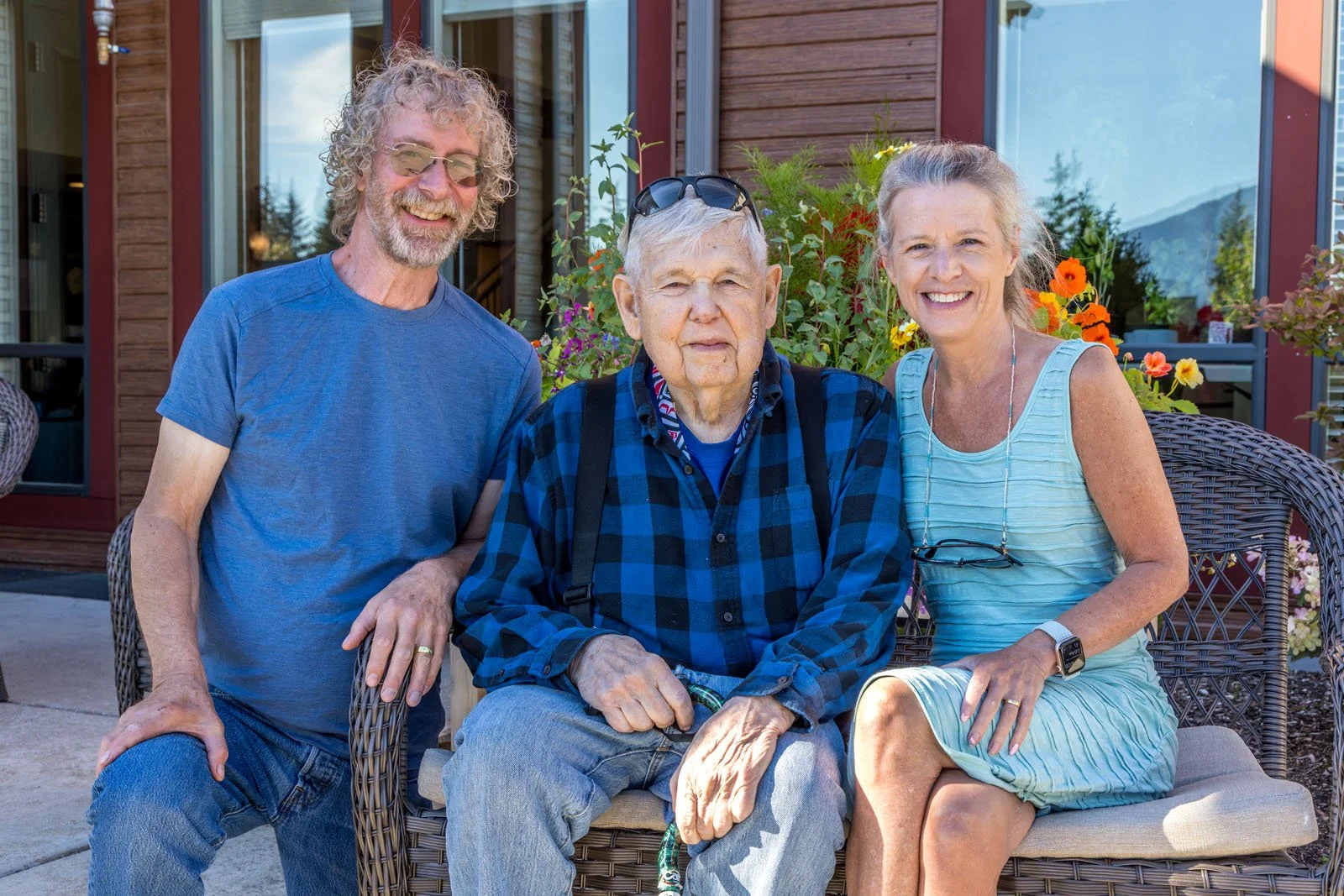 Residents and visitors outdoors at Riverview Senior Living and Memory Care in Juneau Alaska