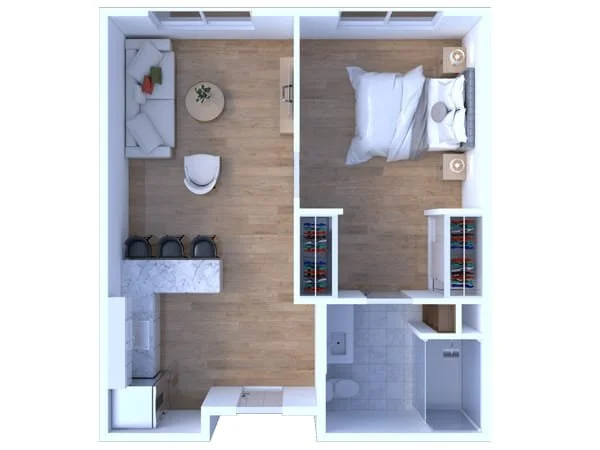 A top-down view of a small apartment showing a combined living room and kitchen area, a bedroom, and a bathroom at Riverview Senior Living and Memory Care in Juneau Alaska