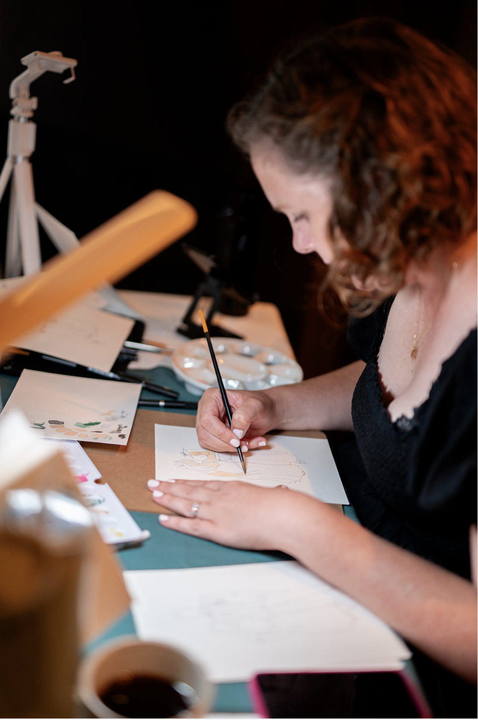 Rachel painting at a wedding