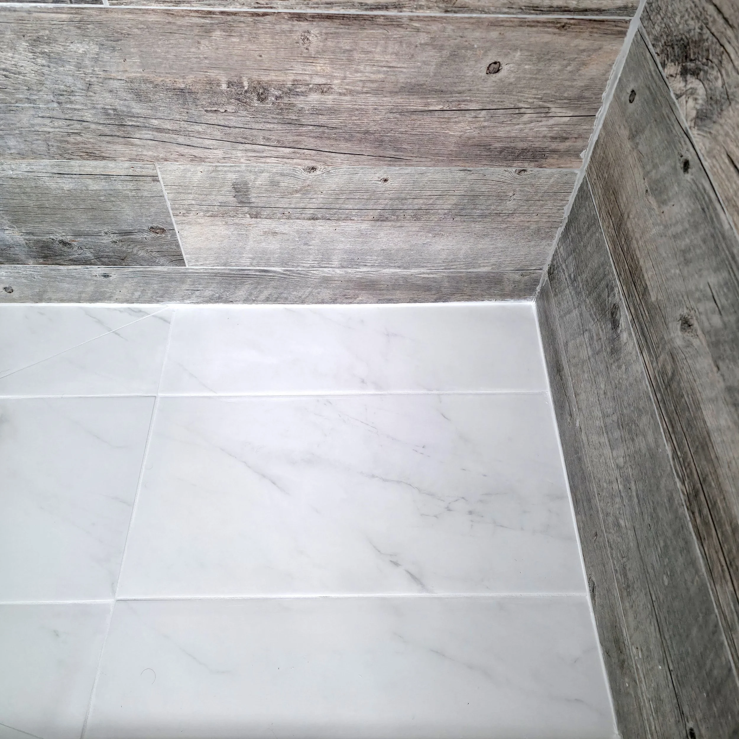 Bathroom renovation in Richmond Hill, Ontario showing the new porcelain tiles installed by Pam Arc inc.