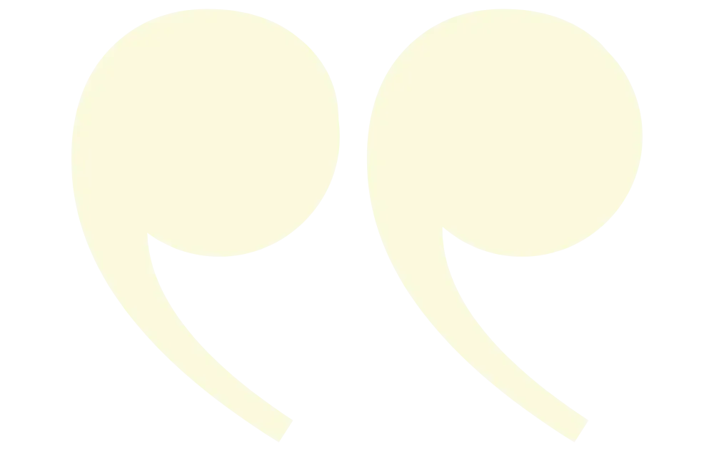 Light yellow quotation marks on a transparent background.