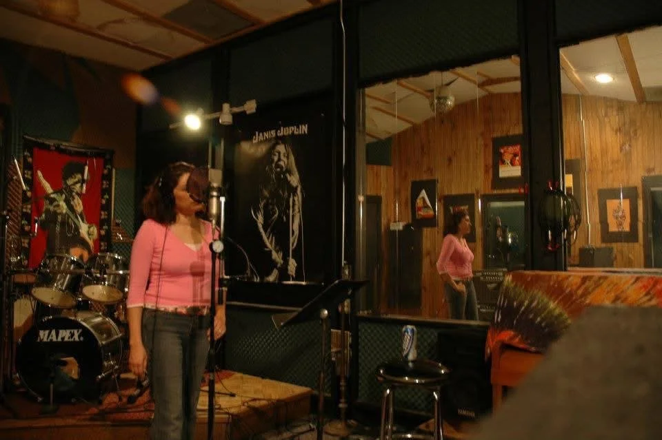 In the Studio, September 2005
Spirit House Studios — Oak Cliff, Dallas, Texas

Recording Hold Me.

Earlier, I had been performing with Misoto Rolira, a three-piece that included me, a guitarist, and my then-husband on drums. After my divorce in 2005,