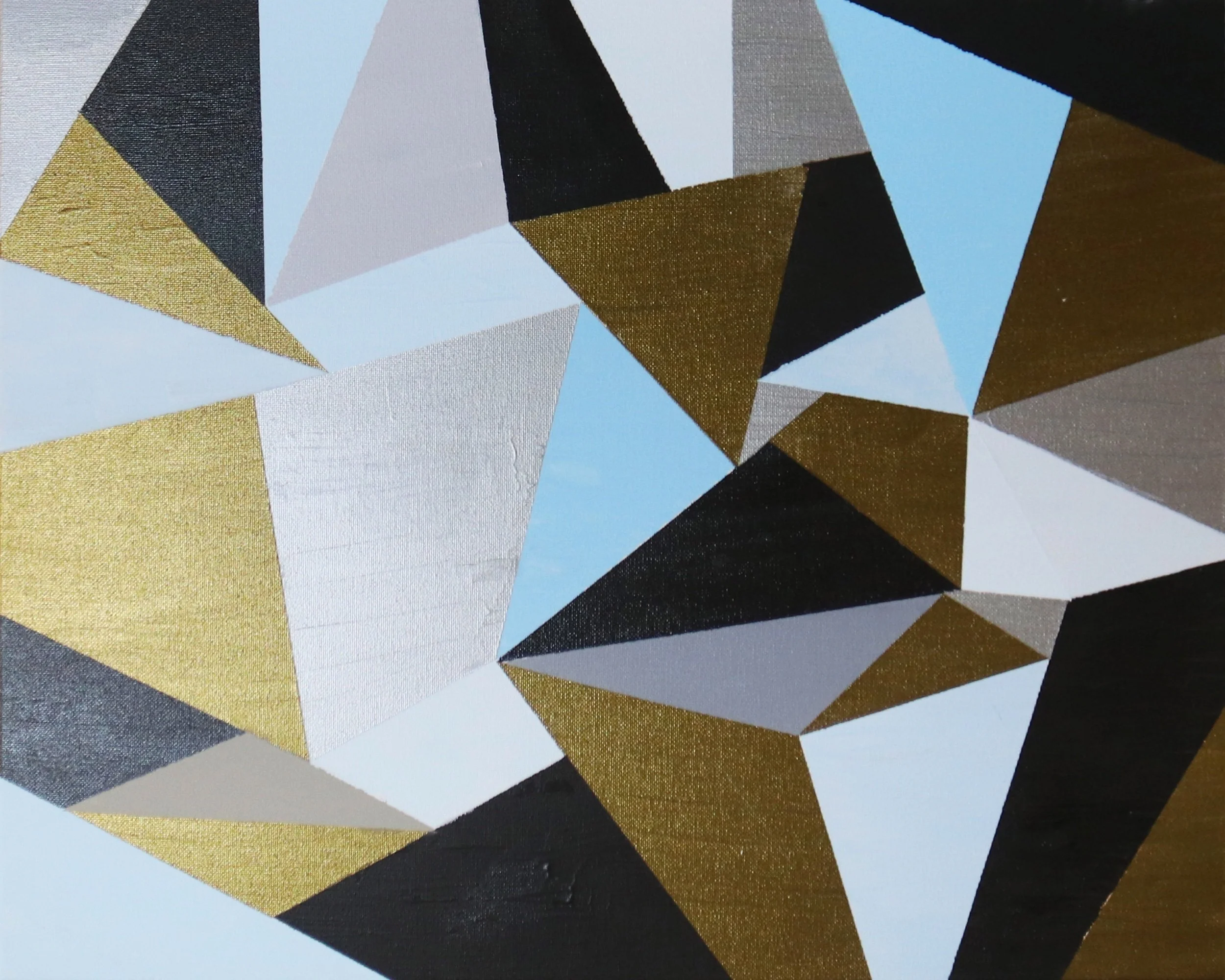Close-up photo of an abstract geometric painting featuring triangles and polygons in shades of black, gray, white, metallic gold, and light blue.