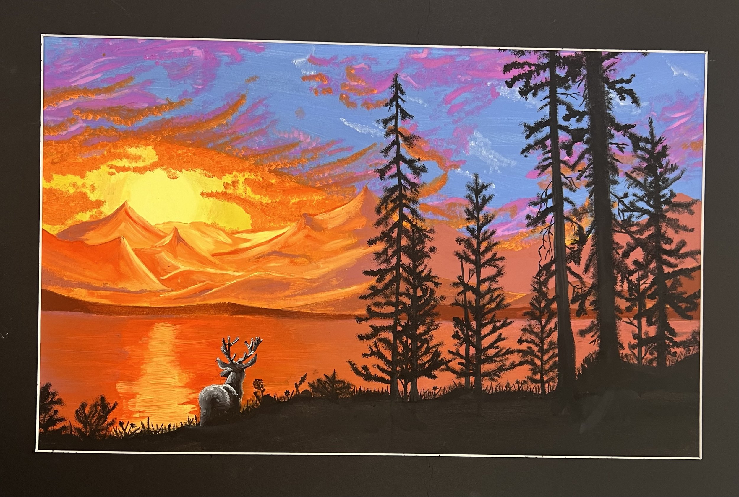 Painting of a sunset over a lake with silhouetted trees and mountains in the background, and a deer in the foreground.