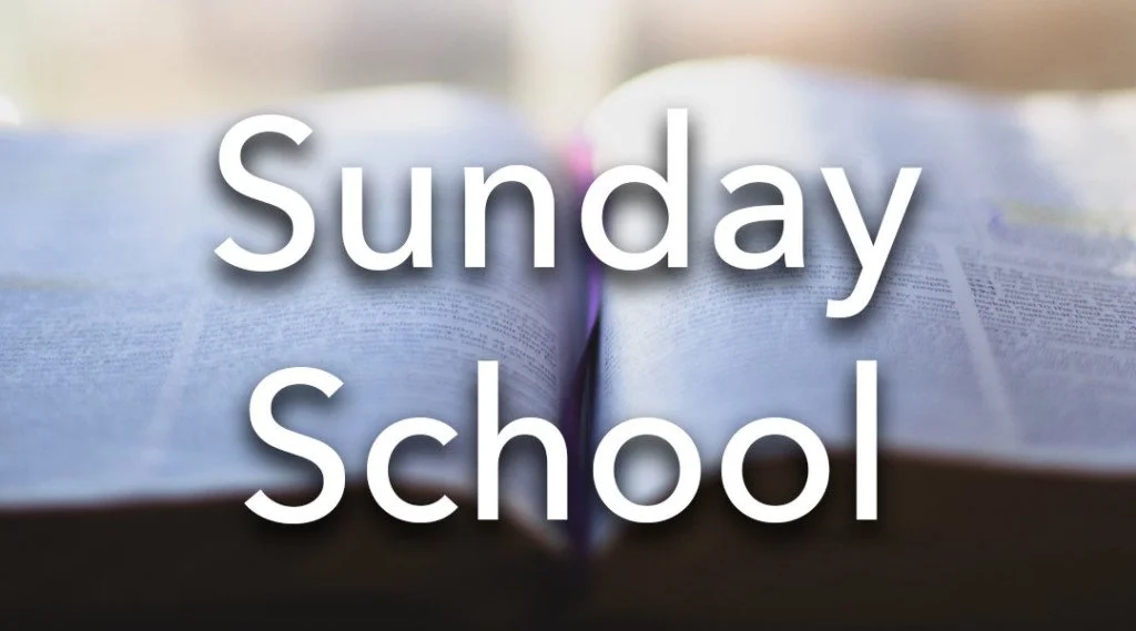 Open book with the words 'Sunday School' overlaid in white text