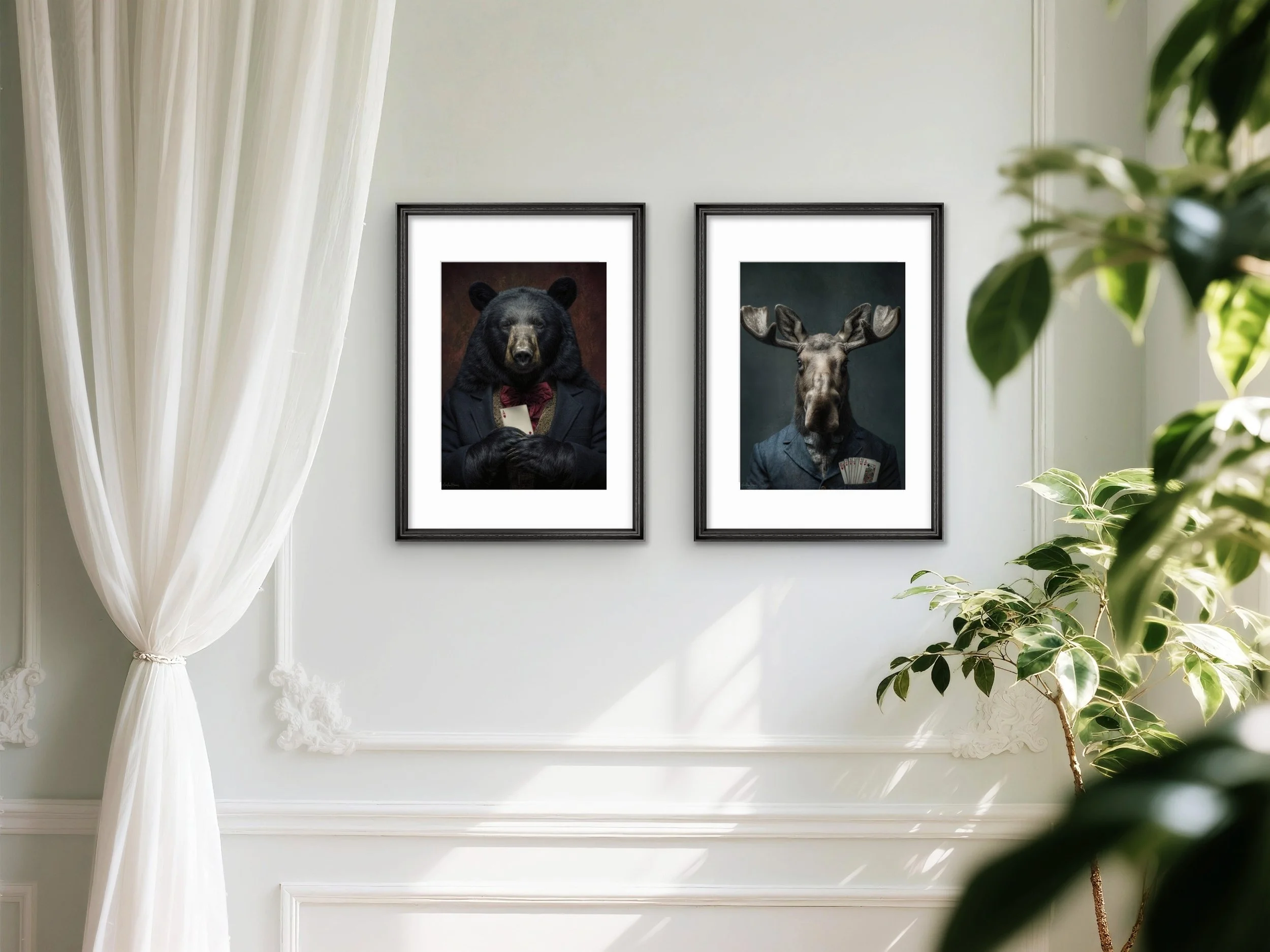 Two framed animal portraits on a white wall: a bear in a suit and bow tie on the left, and a moose in a suit with playing cards in a pocket on the right.