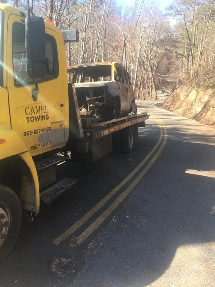 urnt vehicle damaged in 2016 Gatlinburg fires and recovered by Camel Towing