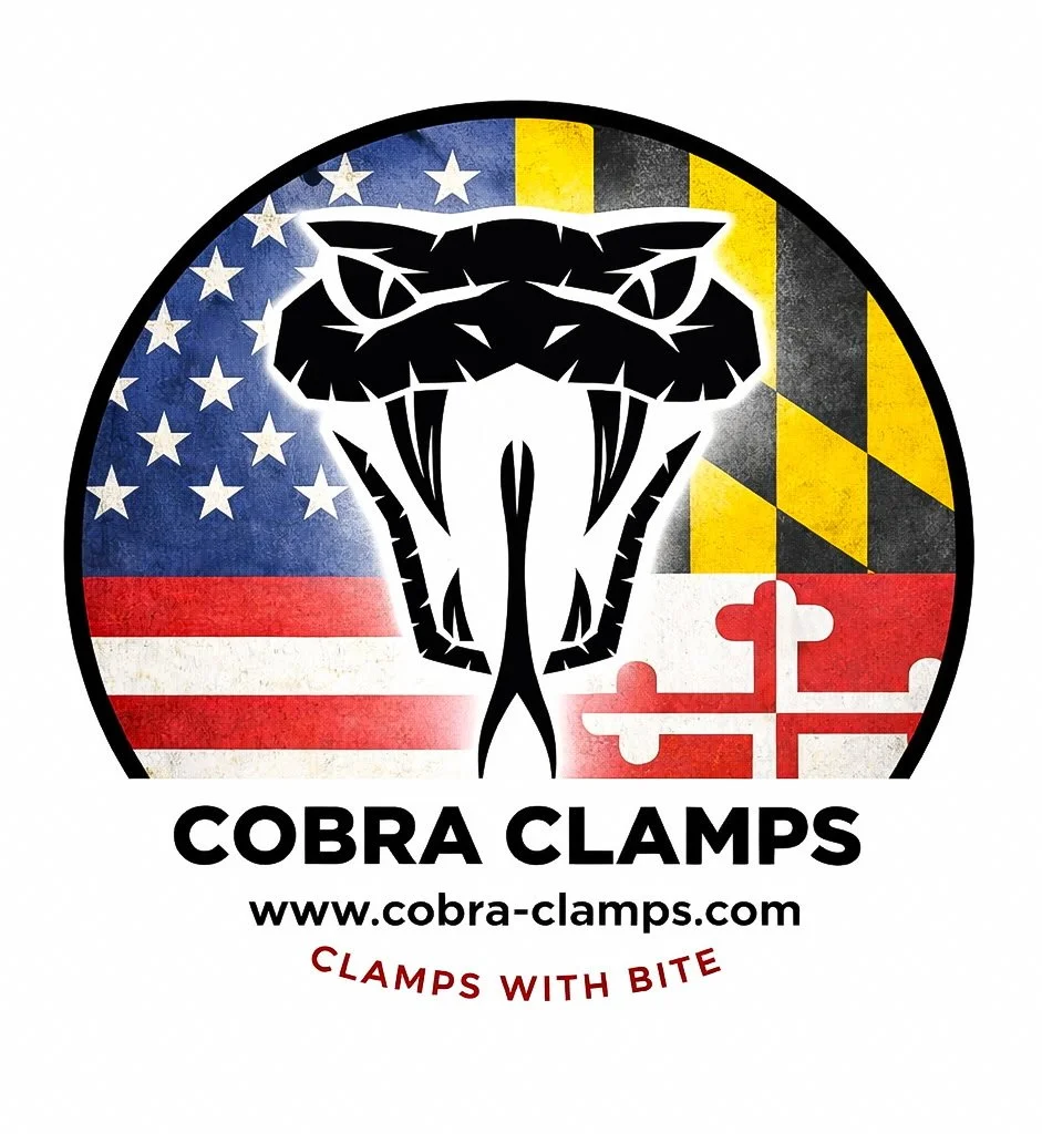 Logo featuring a black and white cobra snake in front of a background with elements of the American flag and the Maryland flag. Text reads 'Cobra Clamps,' the website www.cobra-clamps.com, and the slogan 'Clamps with Bite.'