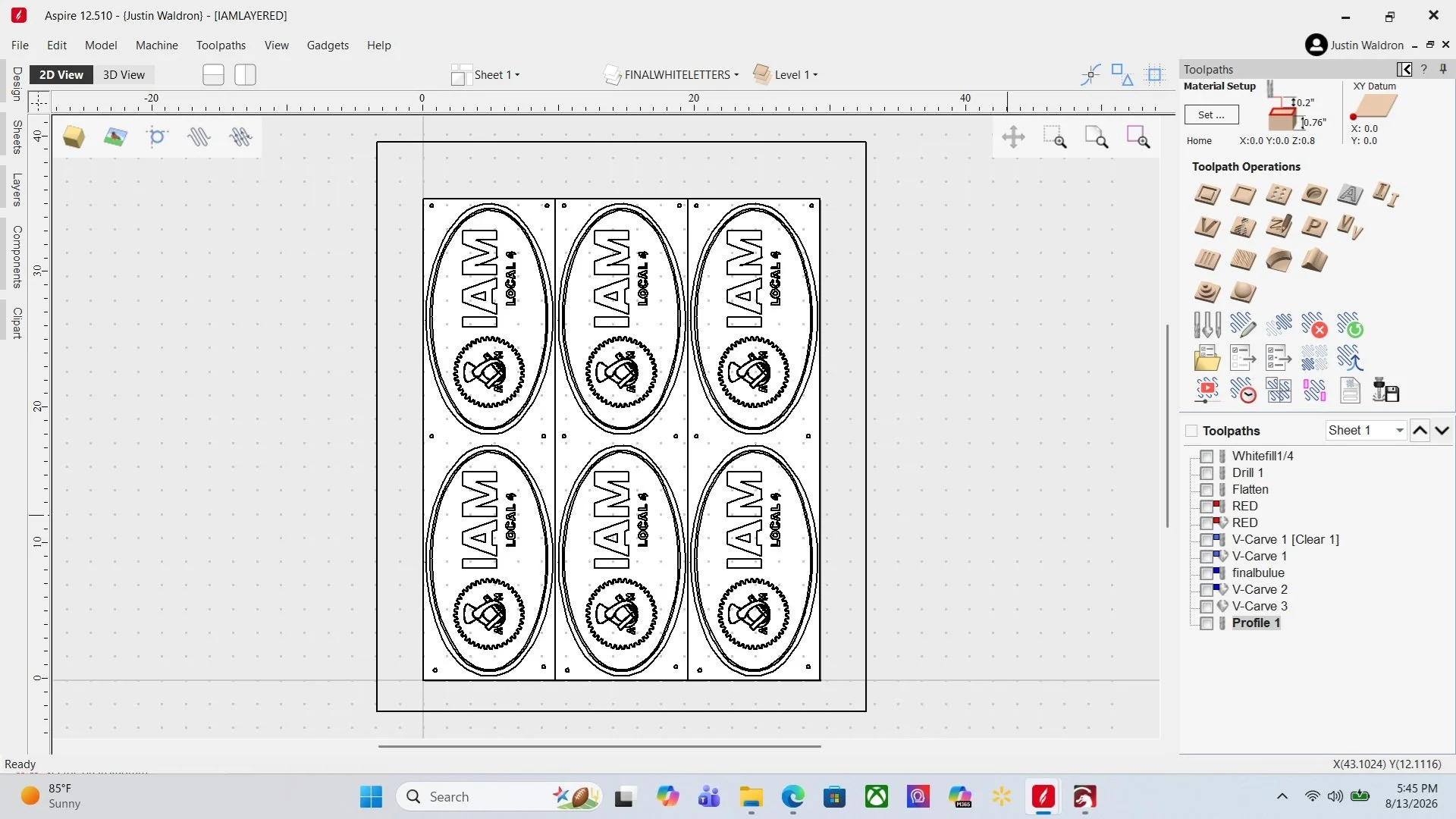 CAD design of six oval-shaped labels with the text "IAM LOGAN" and a gear symbol with a wrench inside, arranged in three rows of two labels each.