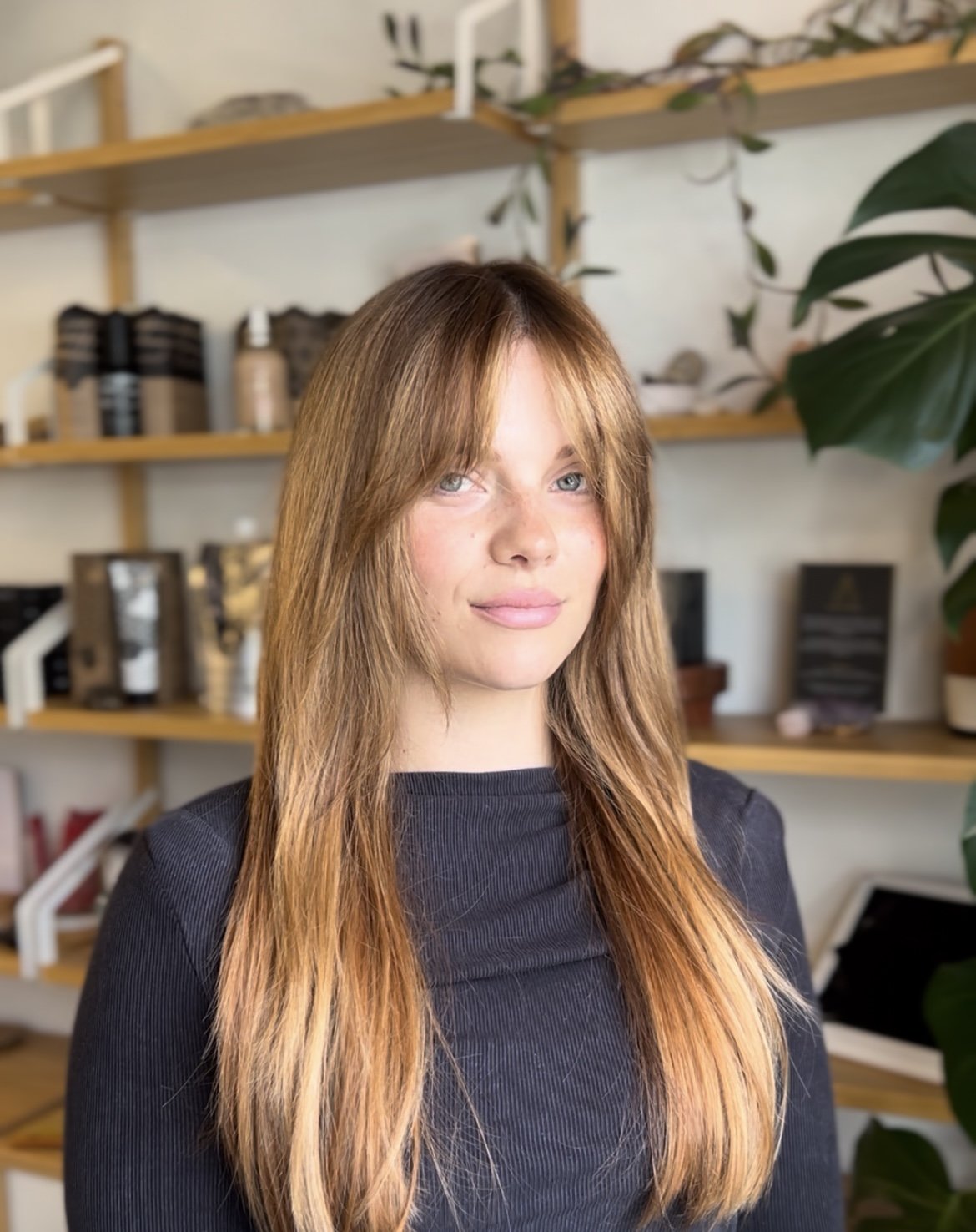 Woman in Eugene Oregon gets posing at a holistic clean salon done by hair x holly