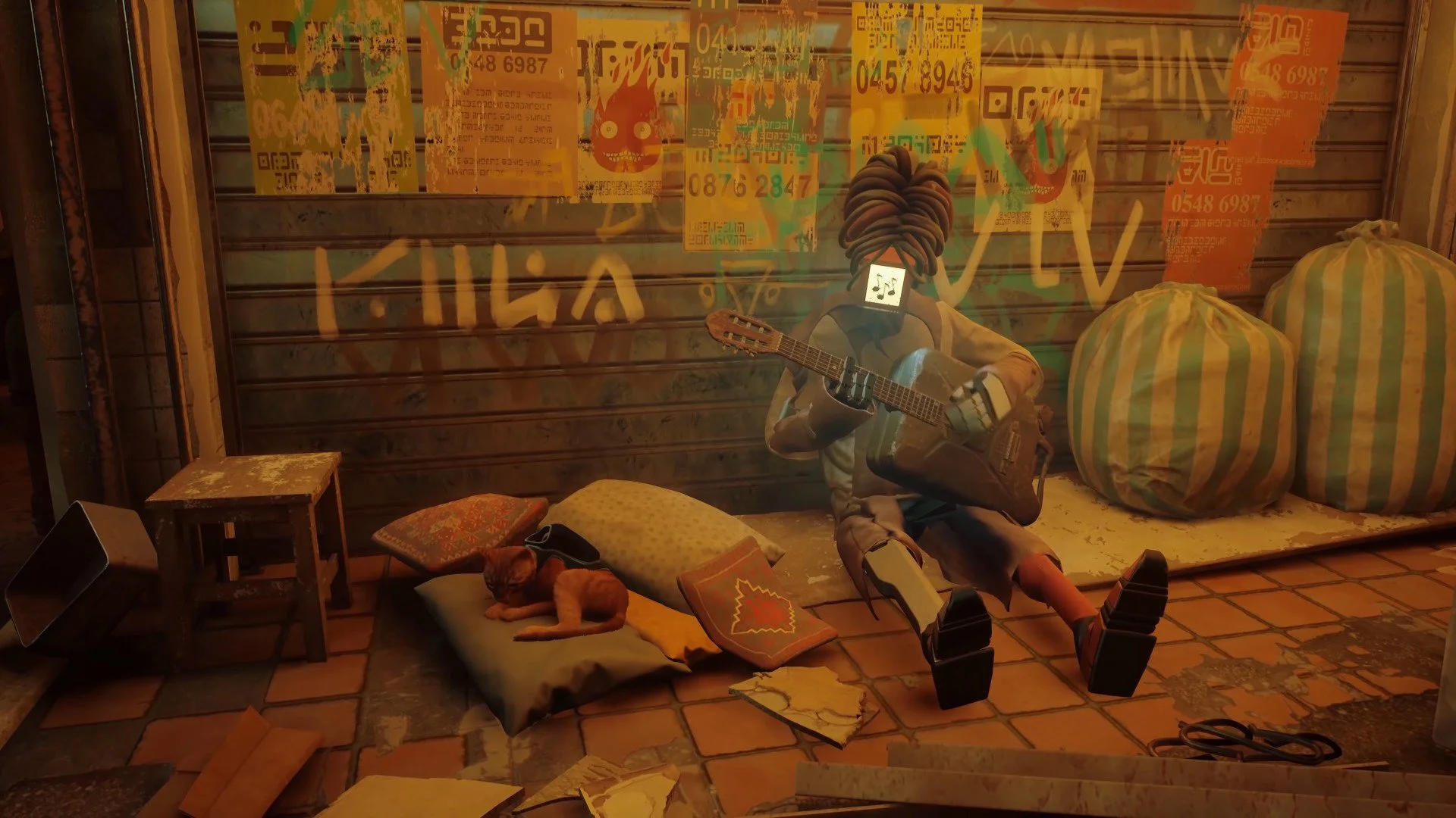 A robot with a head made of coils is playing a guitar while sitting on the ground. Next to the robot, a sleeping cat rests on a pillow with more pillows nearby. Behind them, a storefront window has graffiti and advertisements. To the right, large striped bags are piled on the sidewalk, and a small wooden stool is placed beside the cat.