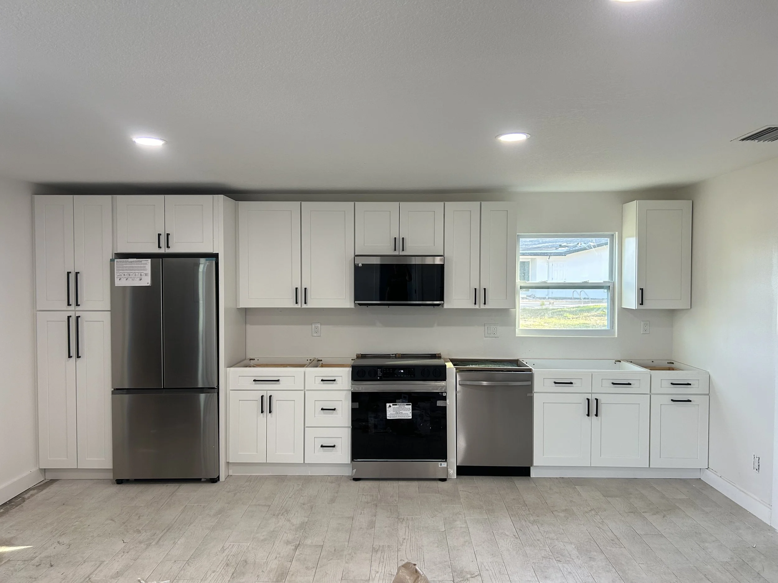 Contemporary Kitchen Remodel by Pluma Build Co project photo