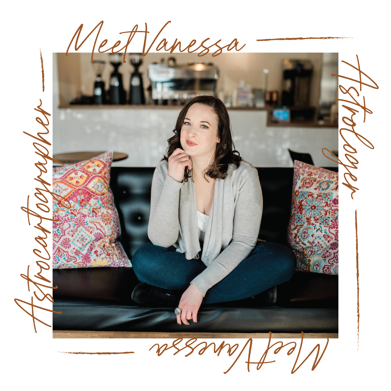 A woman sitting cross-legged on a black leather couch with colorful patterned pillows, in a cafe. She has shoulder-length dark hair, wears a light gray cardigan and blue jeans, and is resting her chin on her hand. The image has a black border with handwritten-style text in brown that reads "Meet Vanessa" along all four sides.