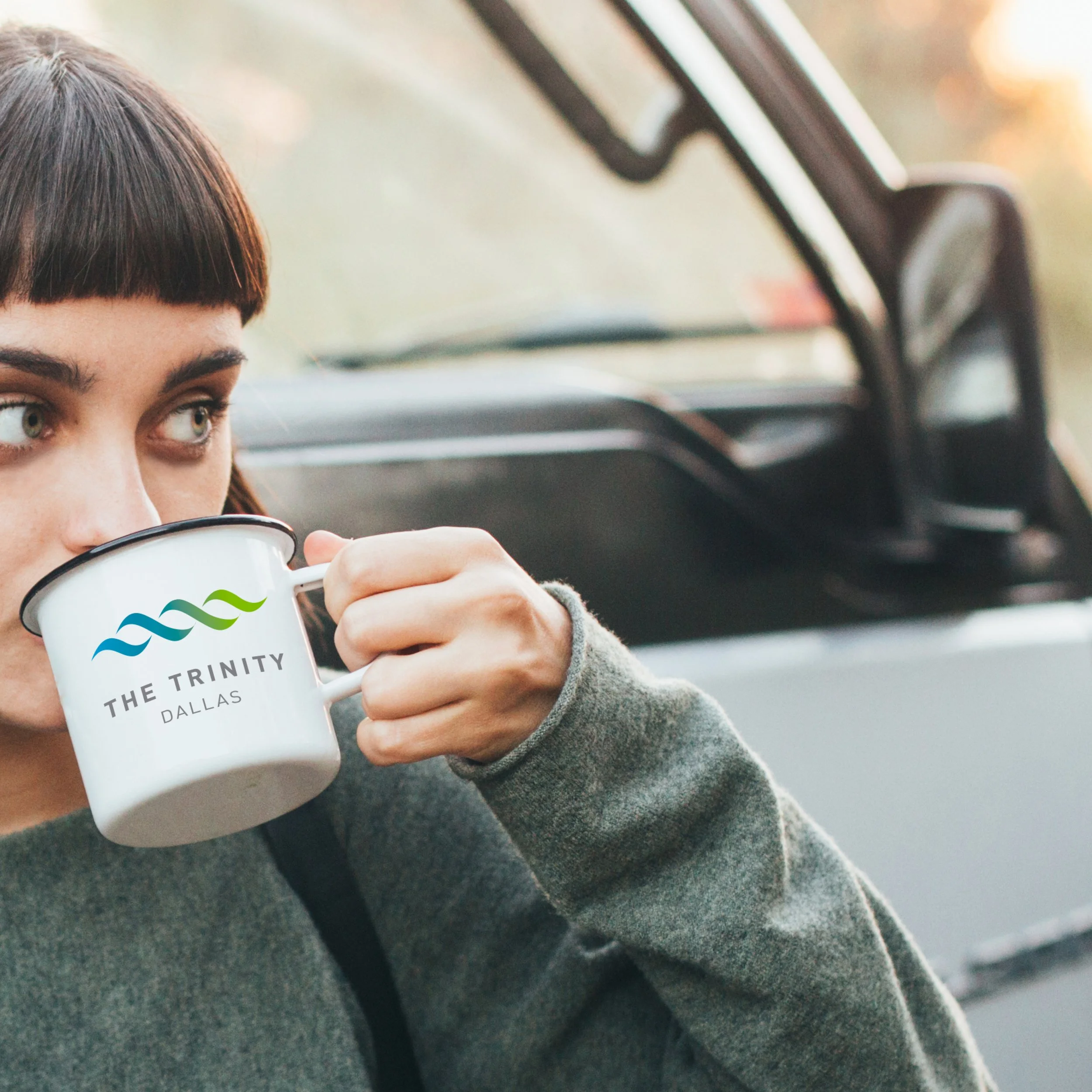 girl drinking from trinity cup.jpg