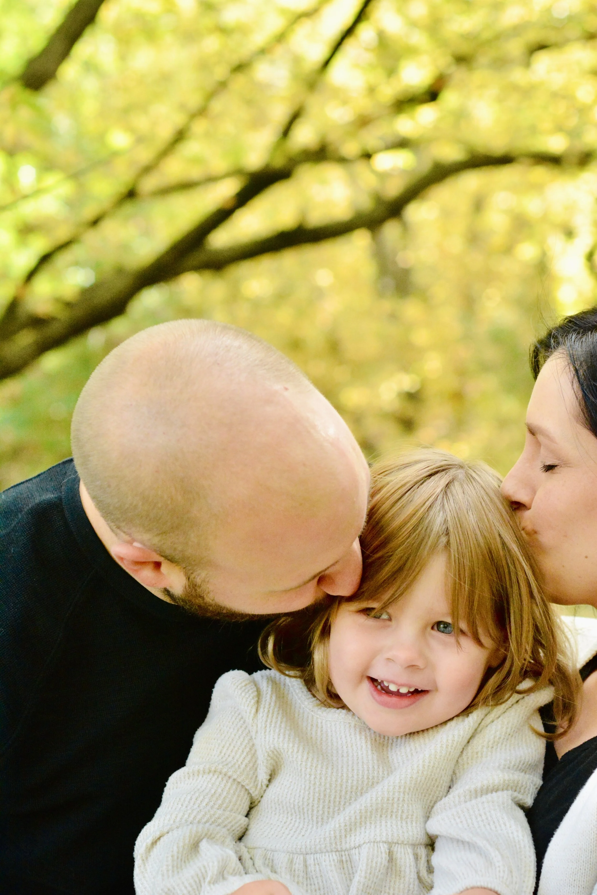 AndreaBrubakerMPLSPhotographer_Family toddler kiss.jpg