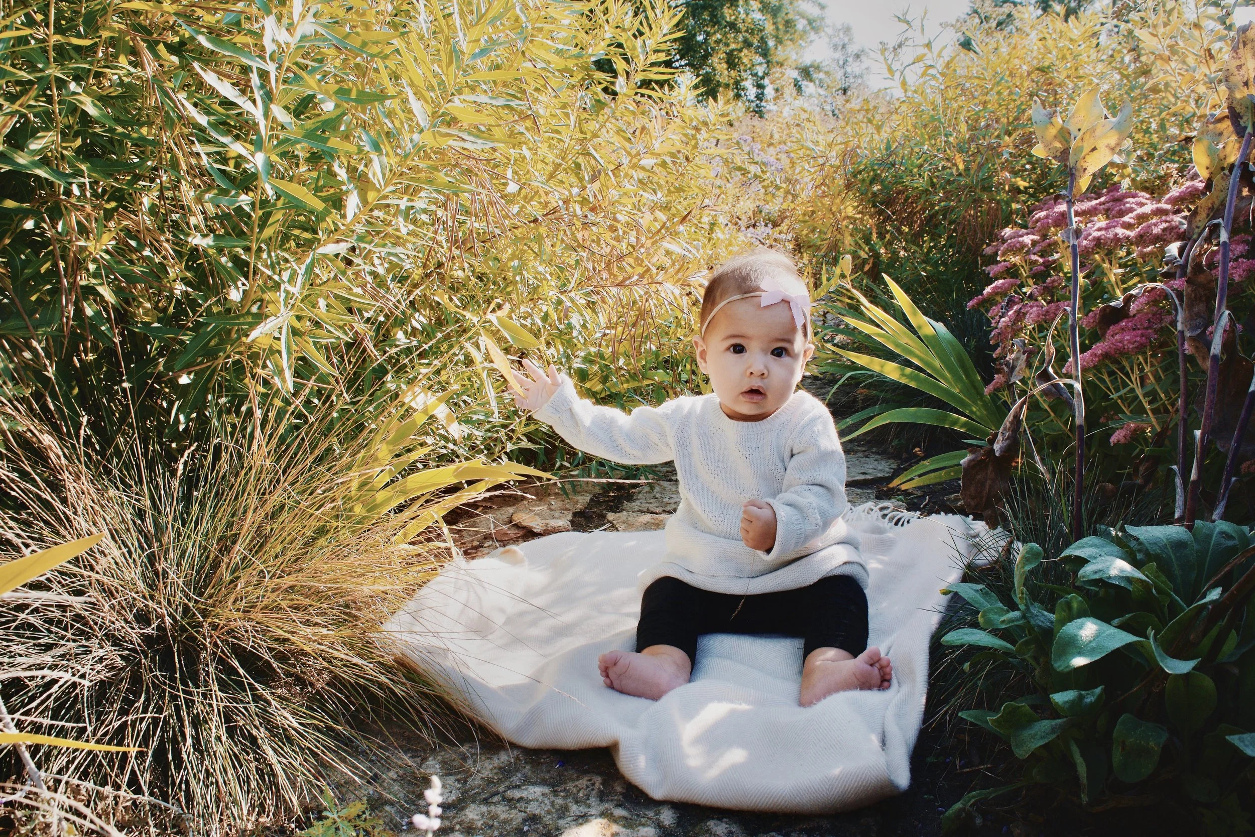AndreaBrubakerMPLSPhotographer_Baby on blanket in flowers.jpeg
