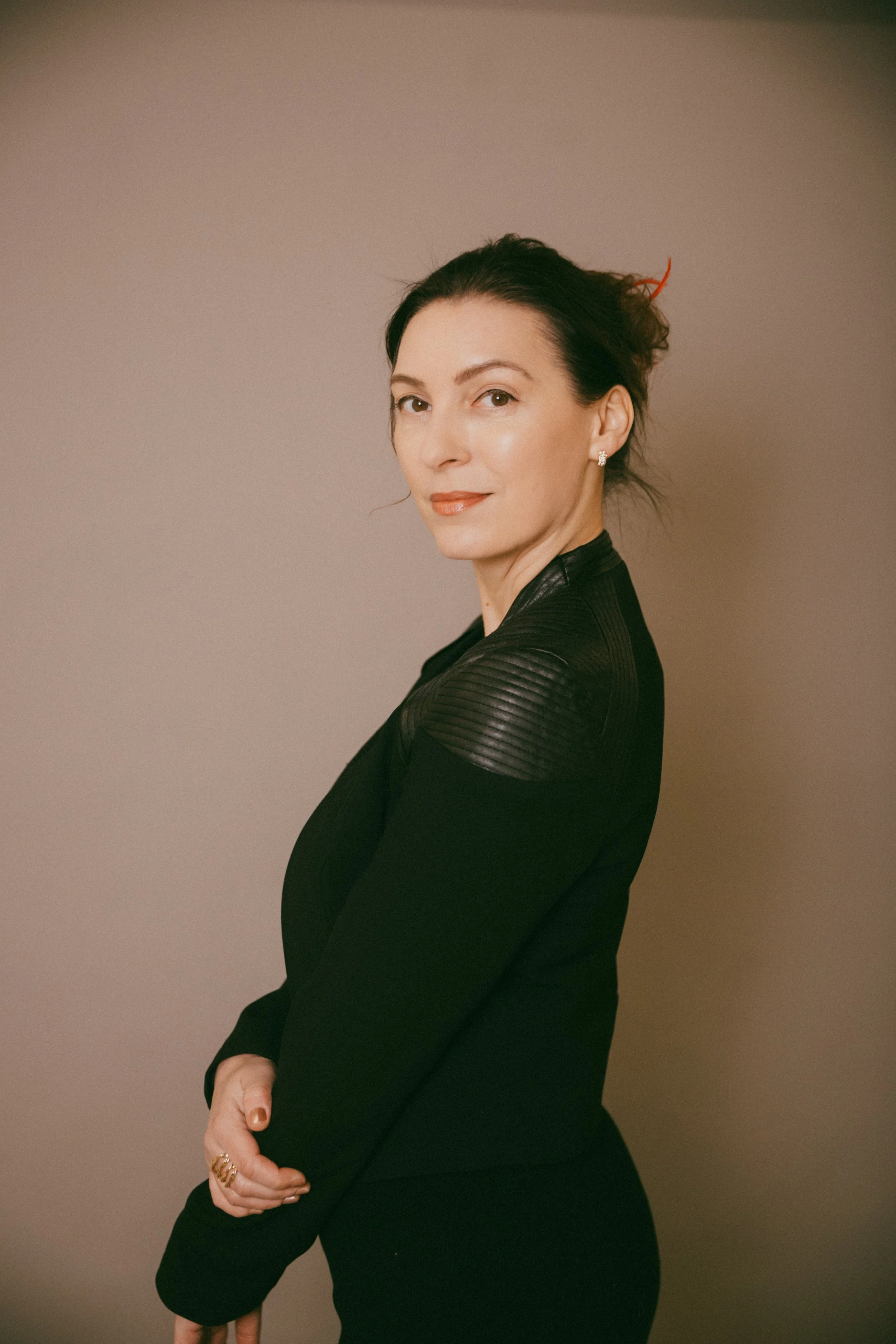 Dr. Kat in studio portrait representing the 30-day private Biological Leadership intensive for high-performing professionals seeking identity-level nervous system precision.