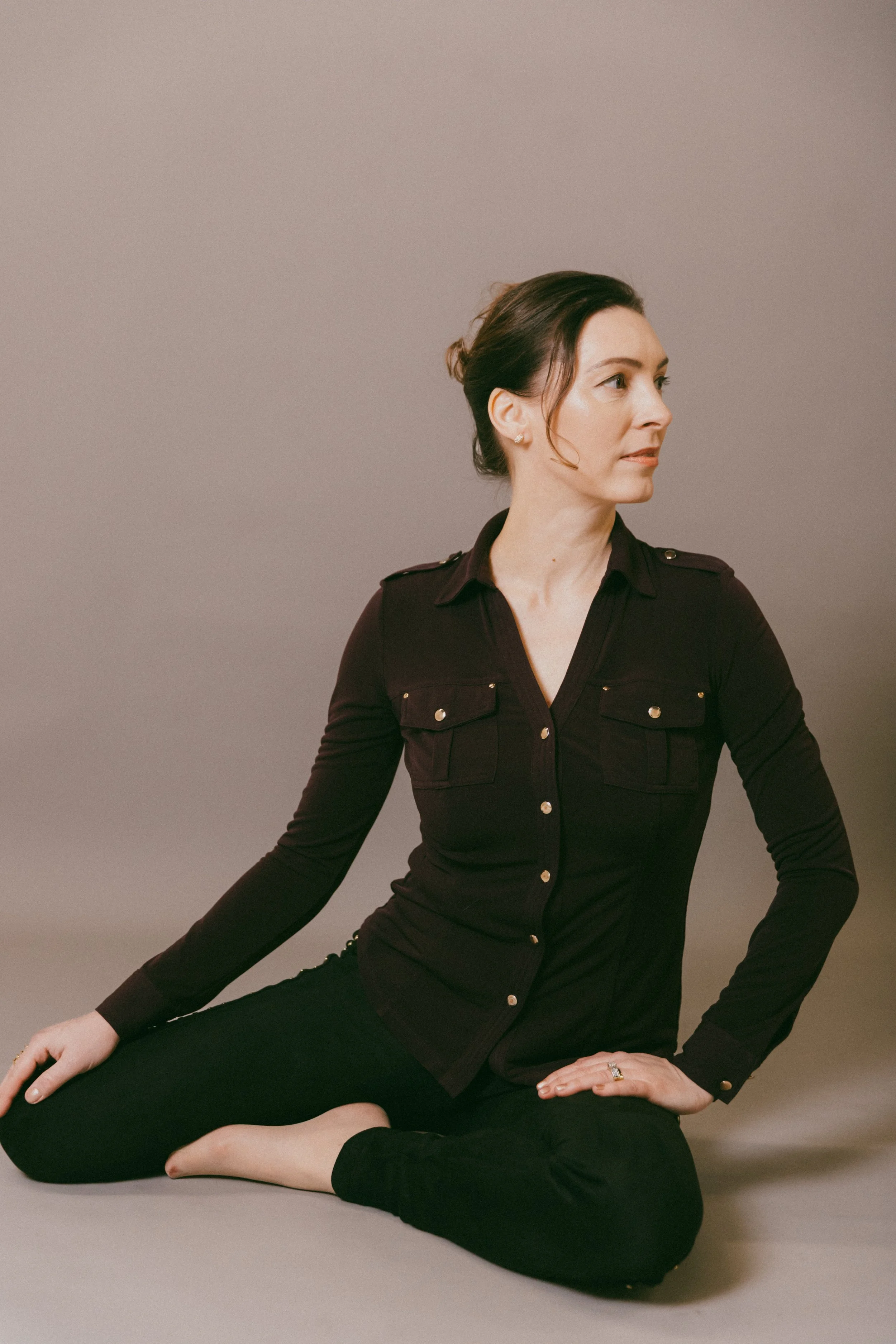 Dr. Kat in studio portrait representing the structured 30-day private Biological Leadership intensive for high-performing professionals seeking advanced nervous system precision and identity expansion.