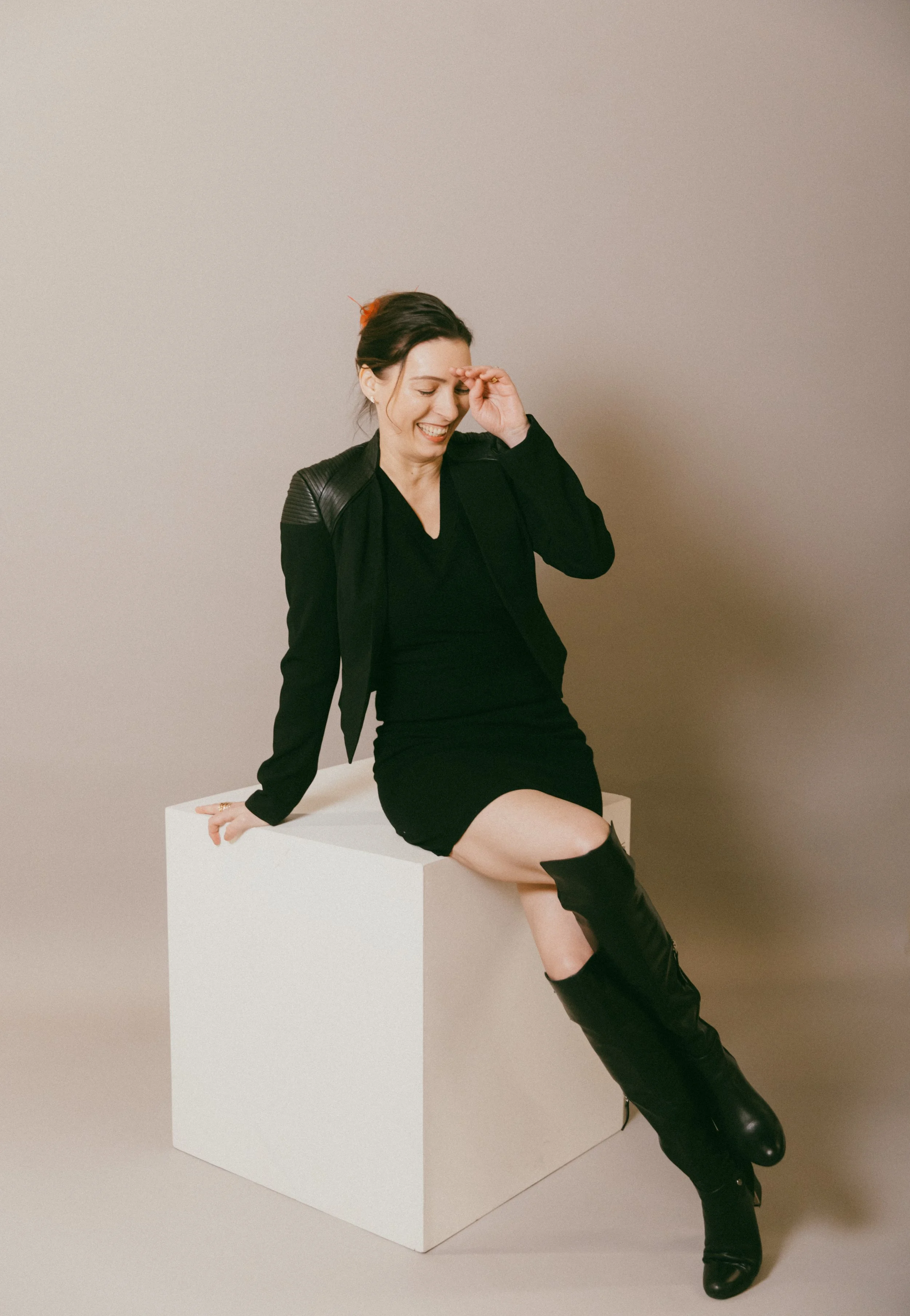 Dr. Kat in a studio portrait reflecting confident leadership and private one-on-one Biological Leadership intensive for high-performing executives and founders.