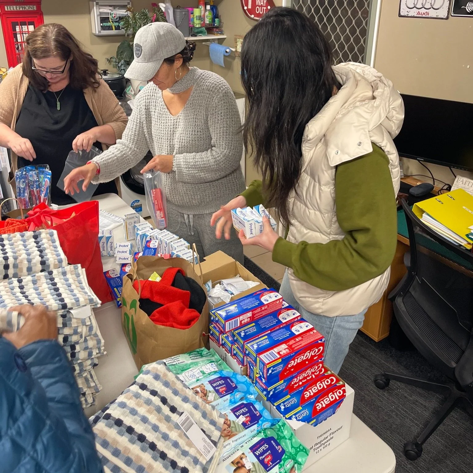 Melissa donated a bunch of toothbrushes and toothpaste for the packs - we added in soap, wipes and a towel with the $$$ we raised